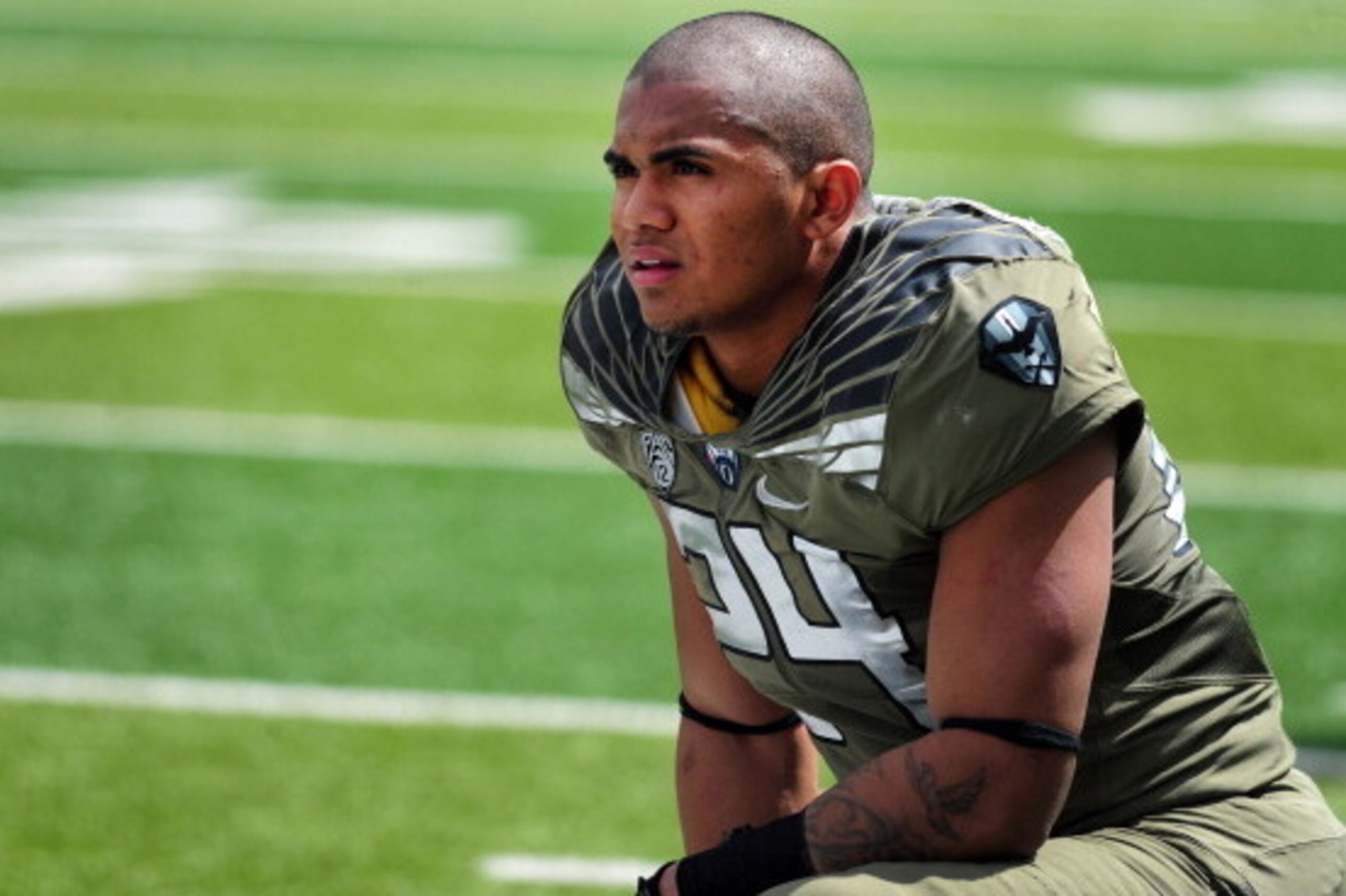 EUGENE, OR - MAY 3: Running back Thomas Tyner #24 of the Oregon Ducks looks on from the sidelines during the spring game at Autzen Stadium on May 3, 2014 in Eugene, Oregon. (Photo by Steve Dykes/Getty Images)