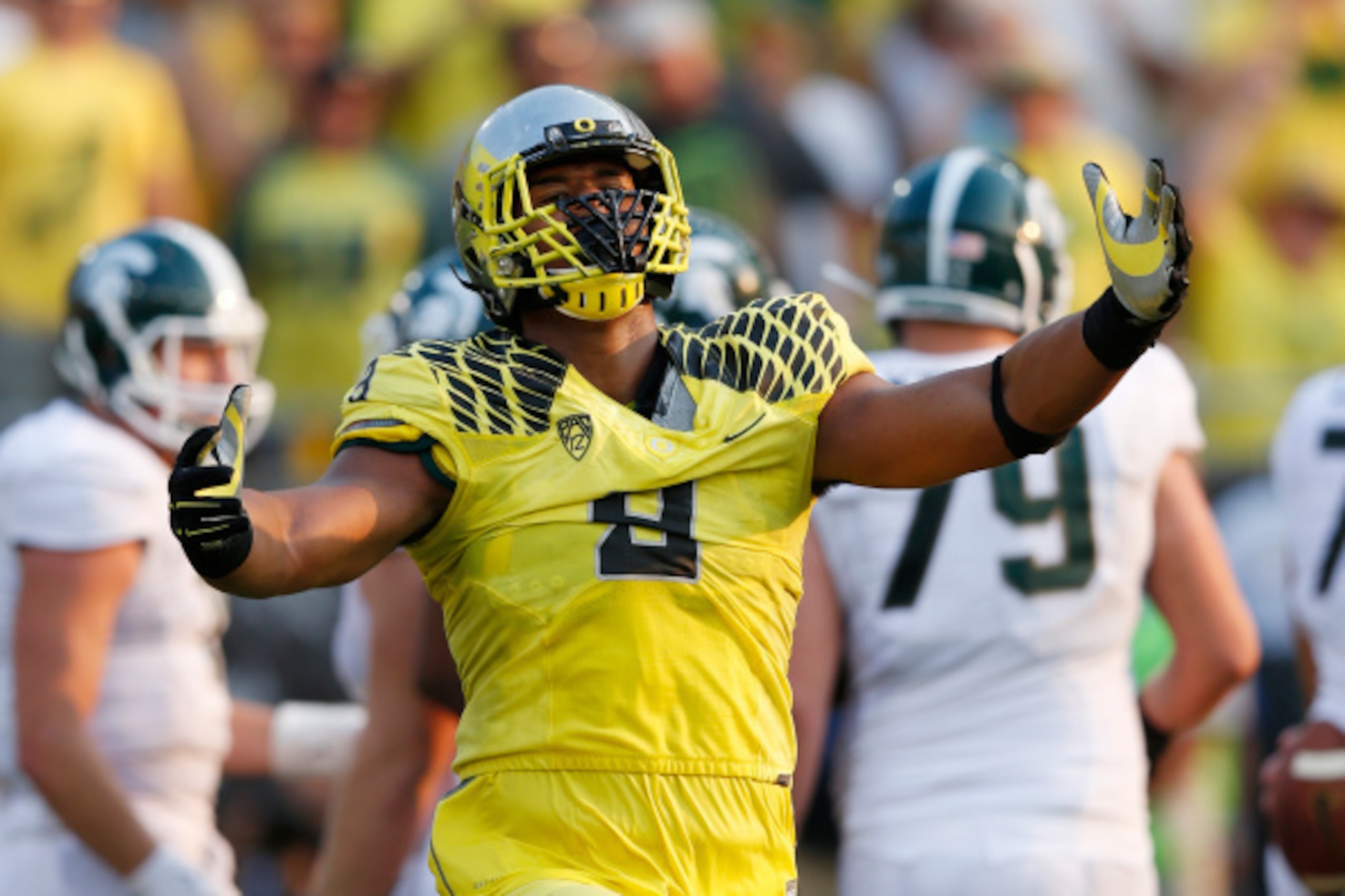 EUGENE, OR - SEPTEMBER 6: Arik Armstead #9 of the Oregon Ducks celebrates after a sack in the second half of the game against the Michigan State Spartans at Autzen Stadium on September 6, 2014 in Eugene, Oregon. Oregon won 46-27. (Photo by Joe Robbins/Get
