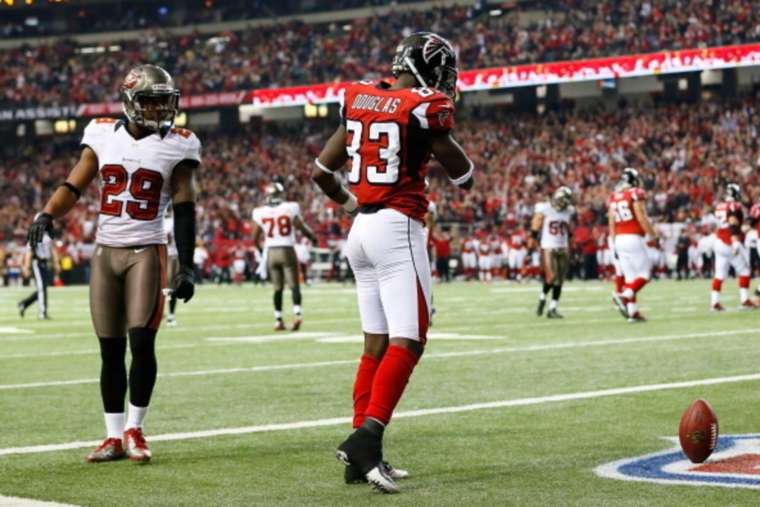 ATLANTA, GA - DECEMBER 30:  Harry Douglas #83 of the Atlanta Falcons reacts after scoring a touchdown against Leonard Johnson #29 and the Tampa Bay Buccaneers at Georgia Dome on December 30, 2012 in Atlanta, Georgia.  (Photo by Kevin C. Cox/Getty Images)