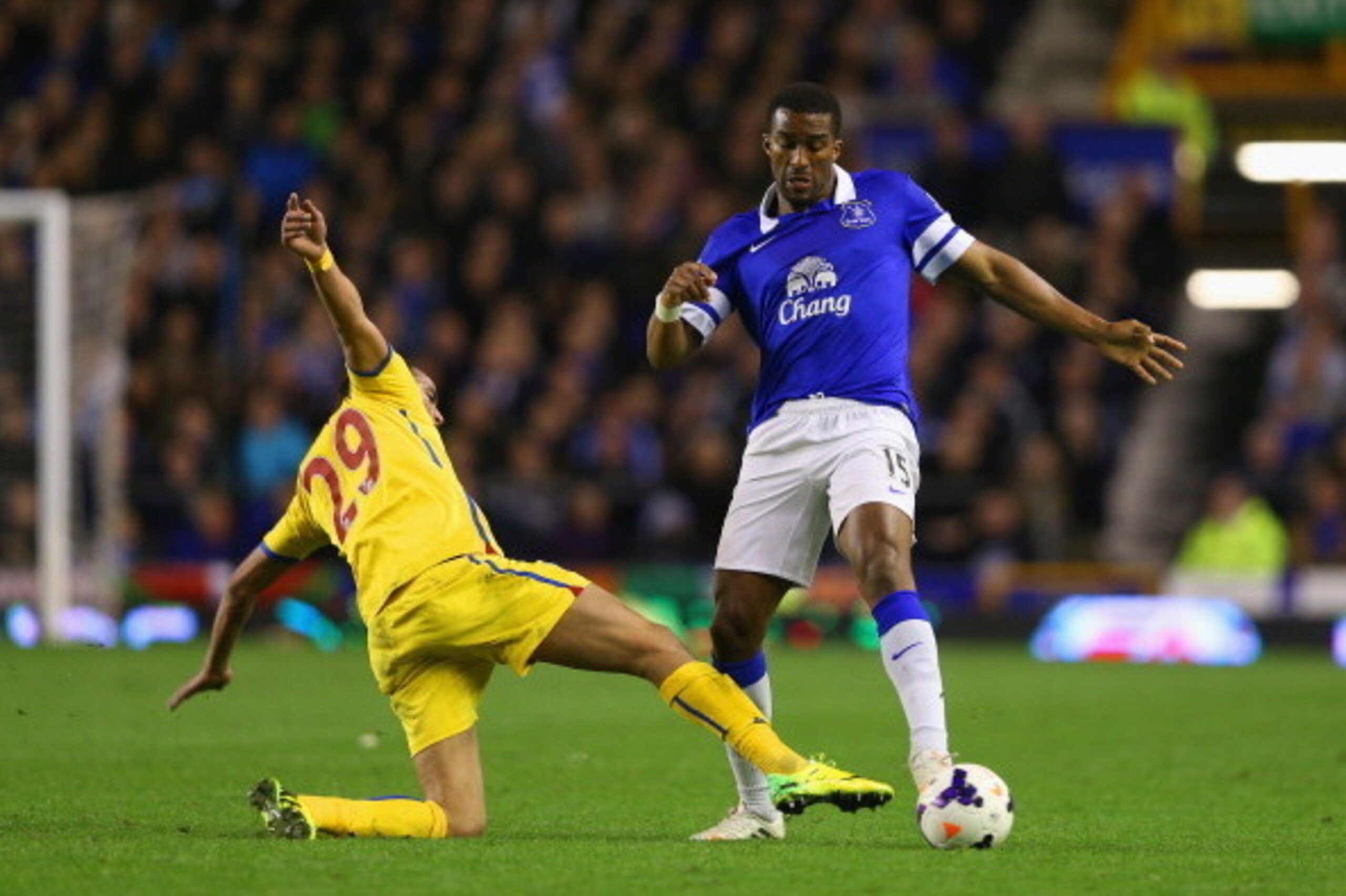 LIVERPOOL, ENGLAND - APRIL 16:  Sylvain Distin of Everton marshalls Marouane Chamakh of Crystal Palace  during the Barclays Premier League match between Everton and Crystal Palace at Goodison Park on April 16, 2014 in Liverpool, England.  (Photo by Clive 