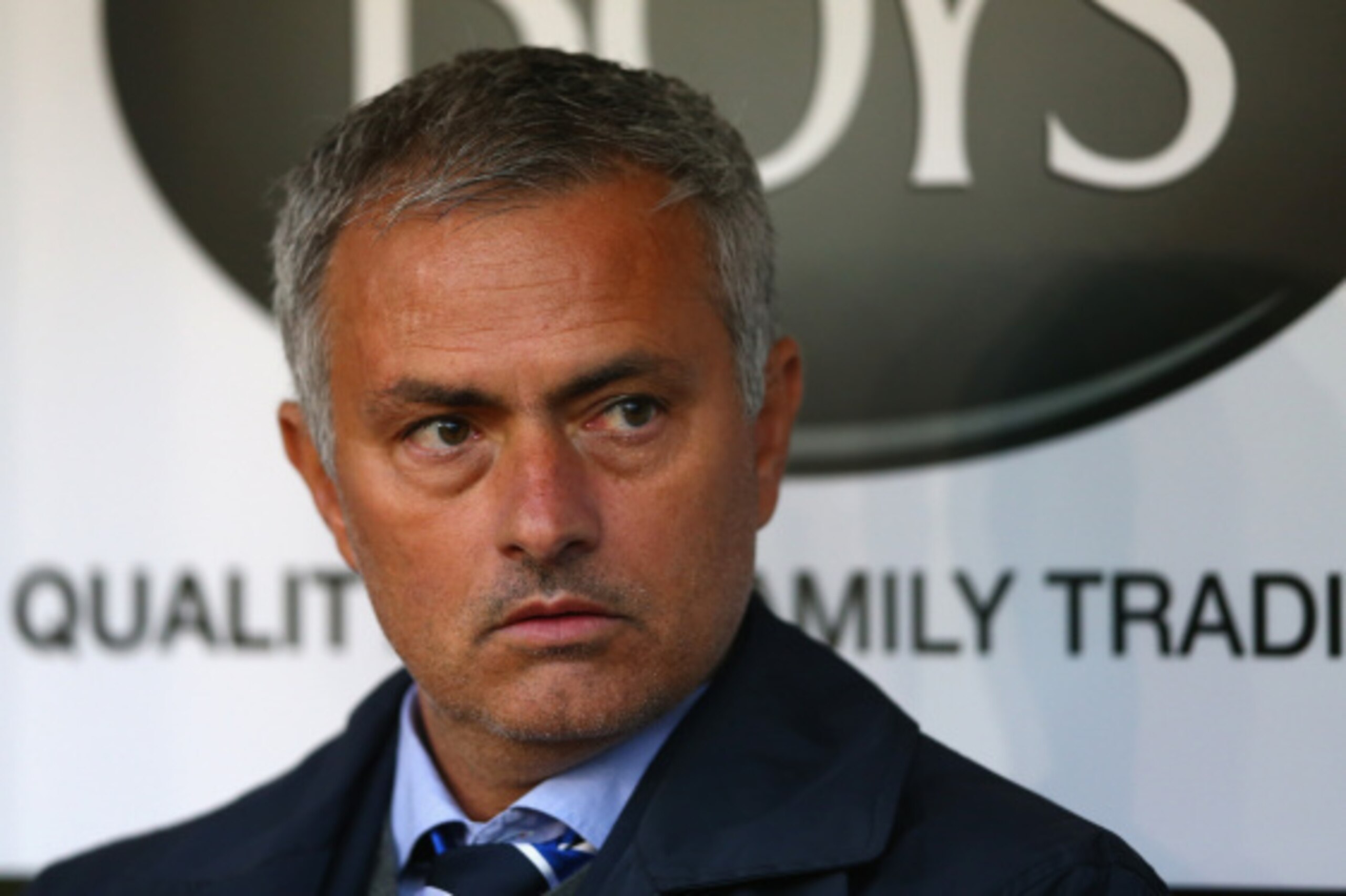 BURNLEY, ENGLAND - AUGUST 18:  Chelsea manager Jose Mourinho in the dug out prior to the Barclays Premier League match between Burnley and Chelsea at Turf Moor on August 18, 2014 in Burnley, England.  (Photo by Clive Brunskill/Getty Images)
