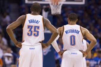 OKLAHOMA CITY, OK - May 27:  Kevin Durant #35 and Russell Westbrook #0 of the Oklahoma City Thunder look on against the San Antonio Spurs in Game 4 of the Western Conference Finals during the 2014 NBA Playoffs at the Chesapeake Arena on May 27, 2014 in Ok