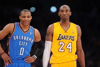 LOS ANGELES, CA - JANUARY 11:  Russell Westbrook #0 of the Oklahoma City Thunder and Kobe Bryant #24 of the Los Angeles Lakers look on during their game at Staples Center on January 11, 2013 in Los Angeles, California. NOTE TO USER: User expressly acknowl