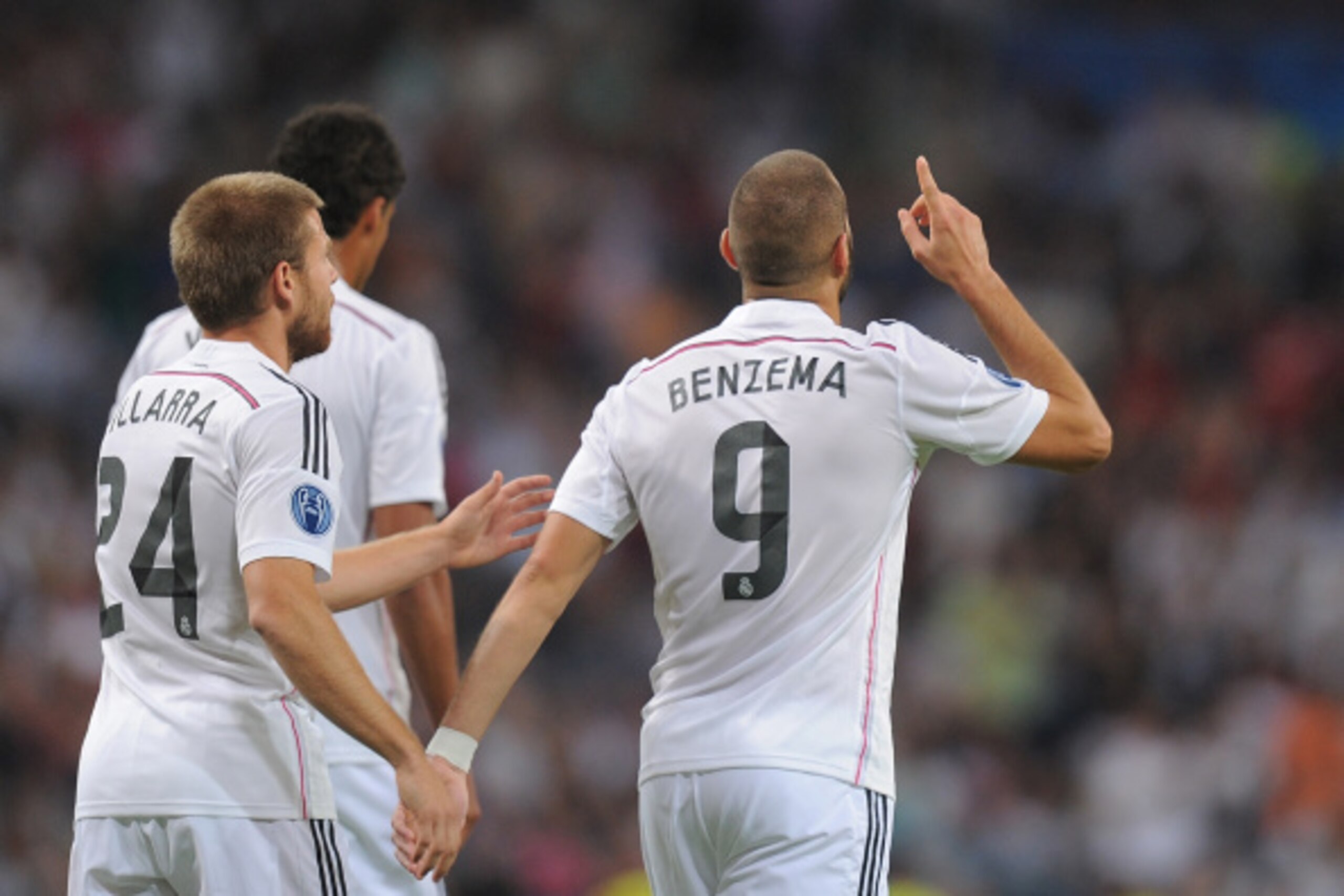 MADRID, SPAIN - SEPTEMBER 16:  Karim Benzema of Real Madrid celebrates after scoring Real's 5th goal and their 1,000 goal in European competitions during the UEFA Champions League Group B match between Real Madrid CF and FC Basel 1893 on September 16, 201