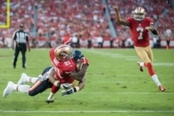 Sep 14, 2014; Santa Clara, CA, USA; San Francisco 49ers running back Frank Gore (21) rushes for a touchdown against the Chicago Bears during the second quarter at Levi's Stadium. Mandatory Credit: Ed Szczepanski-USA TODAY Sports