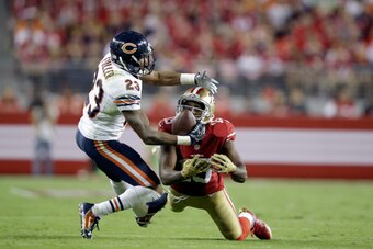 SANTA CLARA, CA - SEPTEMBER 14:  Cornerback Kyle Fuller #23 of the Chicago Bears intercepts a pass intended for wide receiver Michael Crabtree #15 of the San Francisco 49ers at Levi's Stadium on September 14, 2014 in Santa Clara, California.  (Photo by Ez