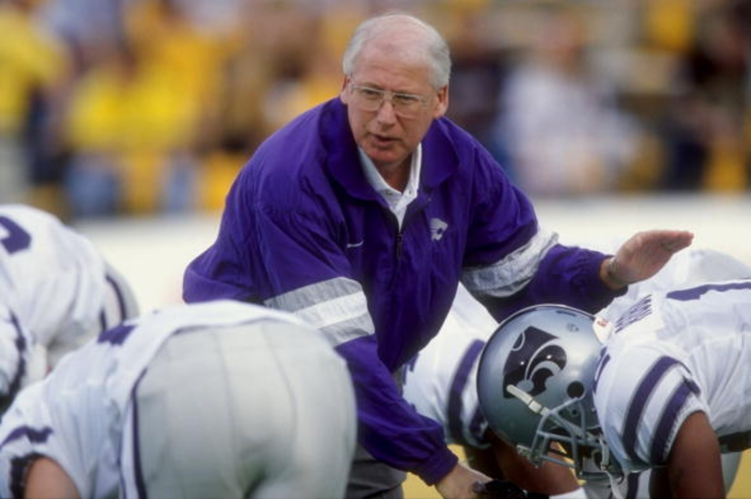 10 Oct 1998:  Head coach Bill Snyder of the Kansas State Wildcats talks to his players during the game against the Colorado Buffaloes at Folsom Field in Boulder, Colorado. The Wildcats defeated the Buffaloes 16-9. Mandatory Credit: Brian Bahr  /Allsport