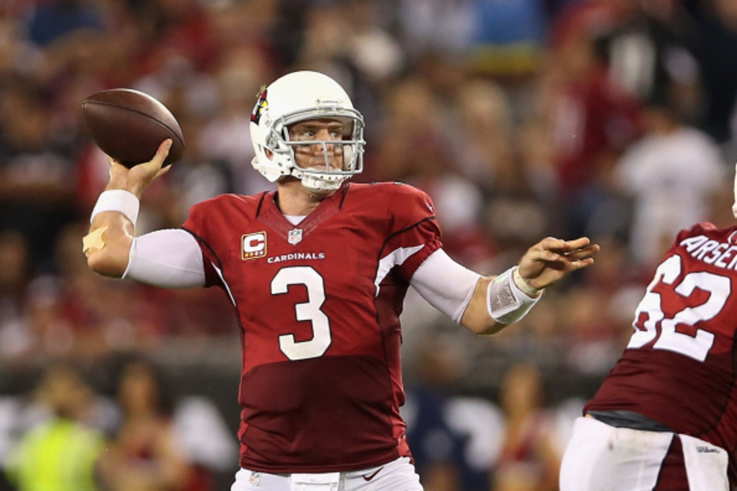 GLENDALE, AZ - SEPTEMBER 08:  Quarterback Carson Palmer #3 of the Arizona Cardinals throws a pass during the NFL game against the San Diego Chargers at the University of Phoenix Stadium on September 8, 2014 in Glendale, Arizona. The Cardinals defeated the