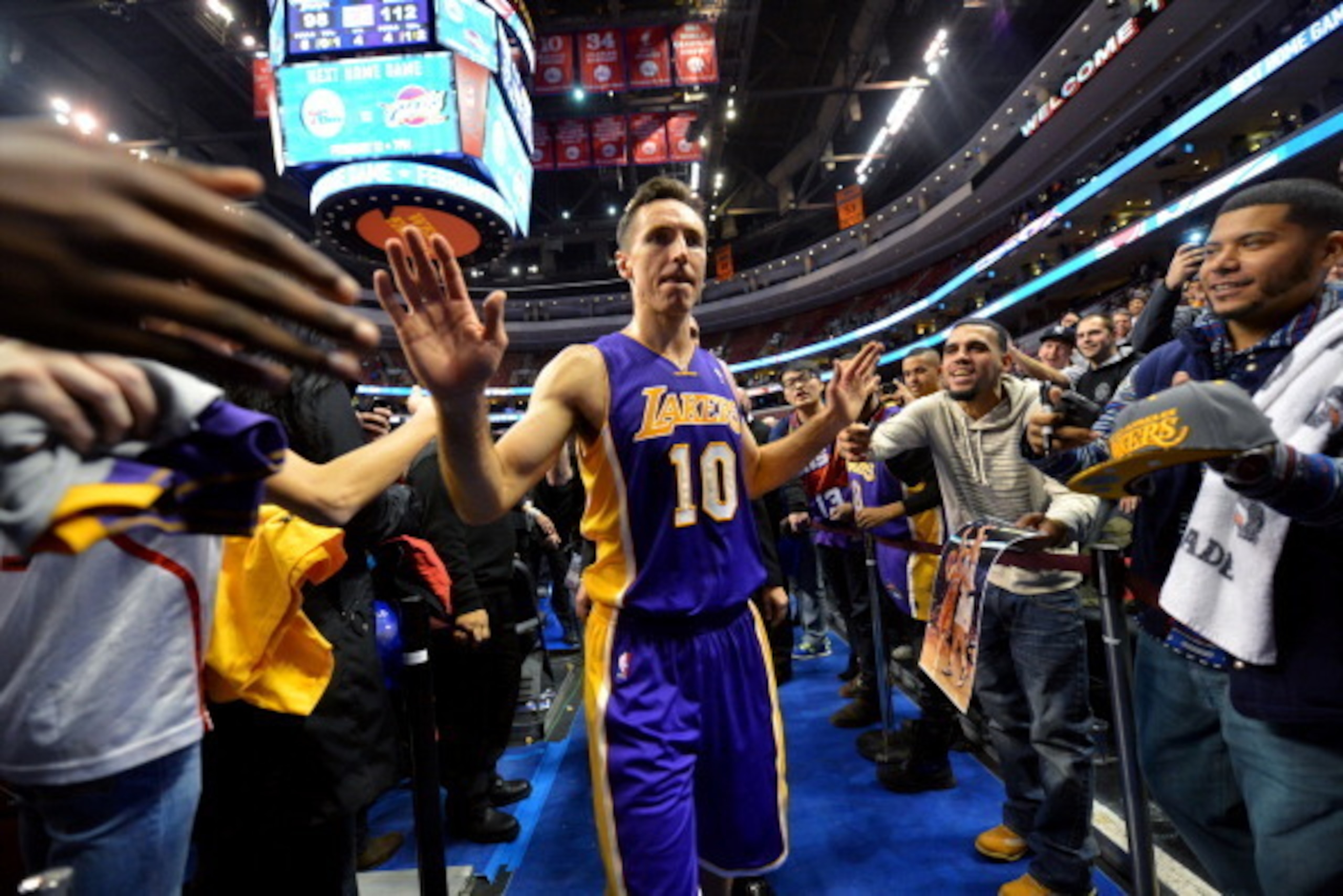 PHILADELPHIA, PA - FEBRUARY 7: Steve Nash #10 of the Los Angeles Lakers celebreates after the game against the Philadelphia 76ers at the Wells Fargo Center on February 7, 2014 in Philadelphia, Pennsylvania. NOTE TO USER: User expressly acknowledges and ag