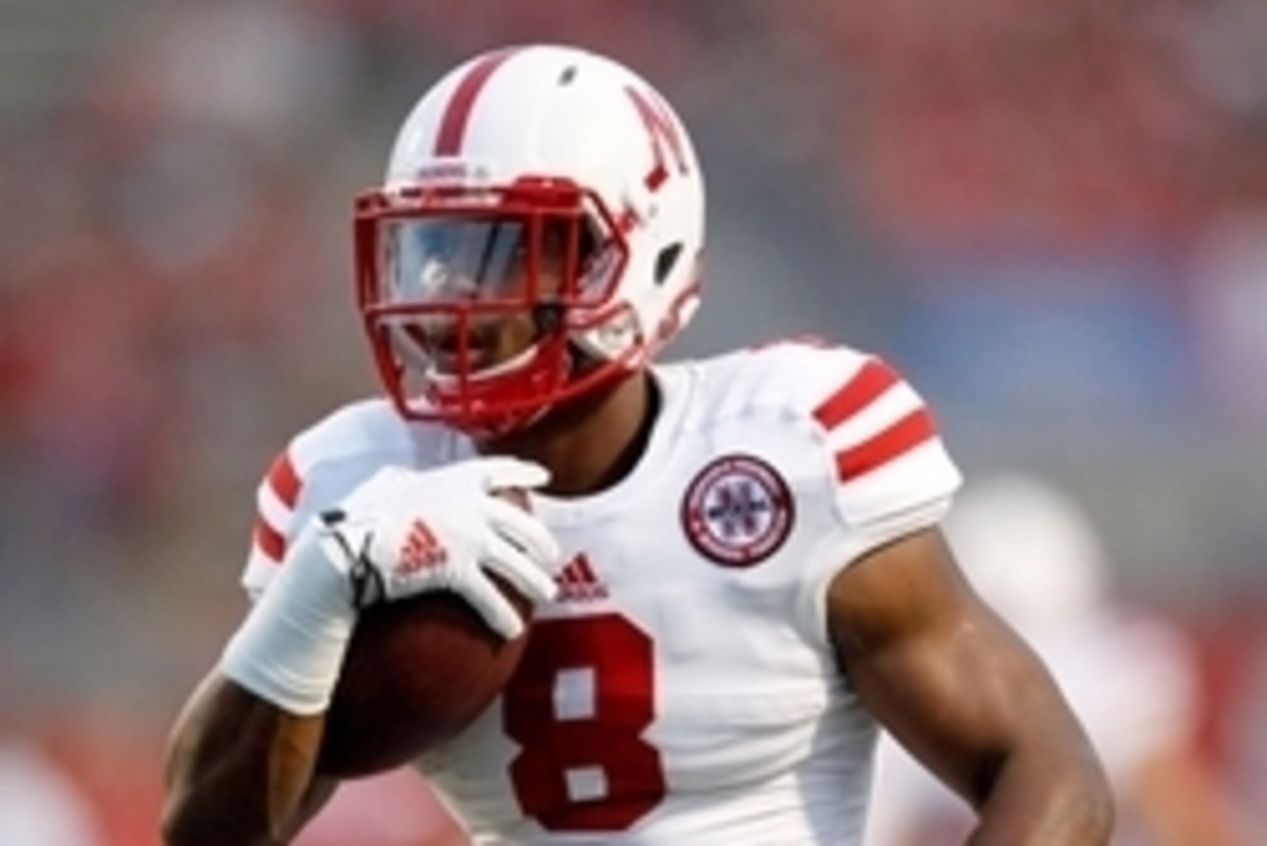 Sep 13, 2014; Fresno, CA, USA; Nebraska Cornhuskers running back Ameer Abdullah (8) warms up before the start of the game against the Fresno State Bulldogs at Bulldog Stadium. Mandatory Credit: Cary Edmondson-USA TODAY Sports