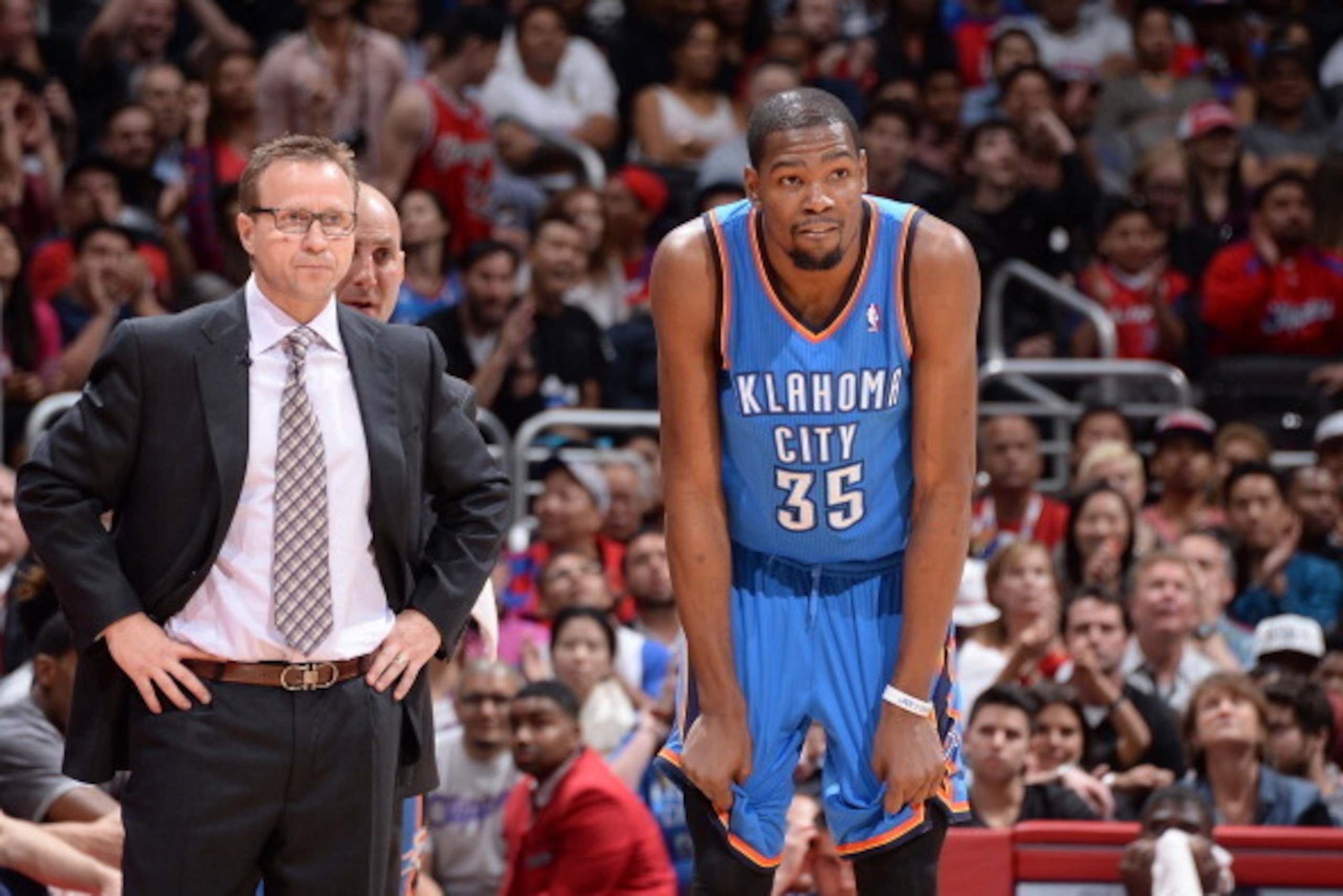 LOS ANGELES, CA - APRIL 9: Head coach Scott Brooks of the Oklahoma City Thunder and Kevin Durant #35 look on against the Los Angeles Clippers at Staples Center on April 9, 2014 in Los Angeles, California. NOTE TO USER: User expressly acknowledges and agre