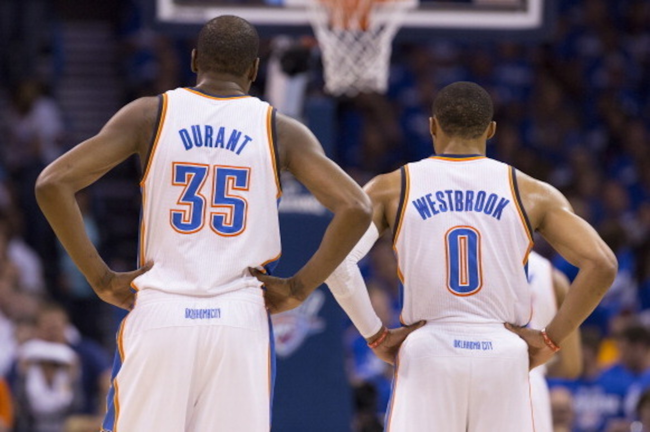 OKLAHOMA CITY, OK - May 27:  Kevin Durant #35 and Russell Westbrook #0 of the Oklahoma City Thunder look on against the San Antonio Spurs in Game 4 of the Western Conference Finals during the 2014 NBA Playoffs at the Chesapeake Arena on May 27, 2014 in Ok