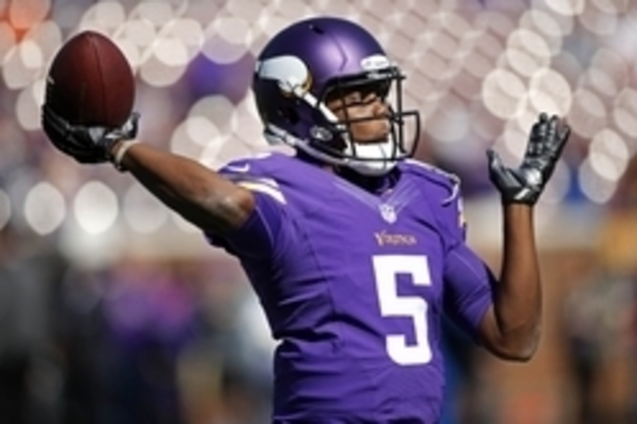 Sep 14, 2014; Minneapolis, MN, USA; Minnesota Vikings quarterback Teddy Bridgewater (5) throws before the game against the New England Patriots at TCF Bank Stadium. Mandatory Credit: Bruce Kluckhohn-USA TODAY Sports