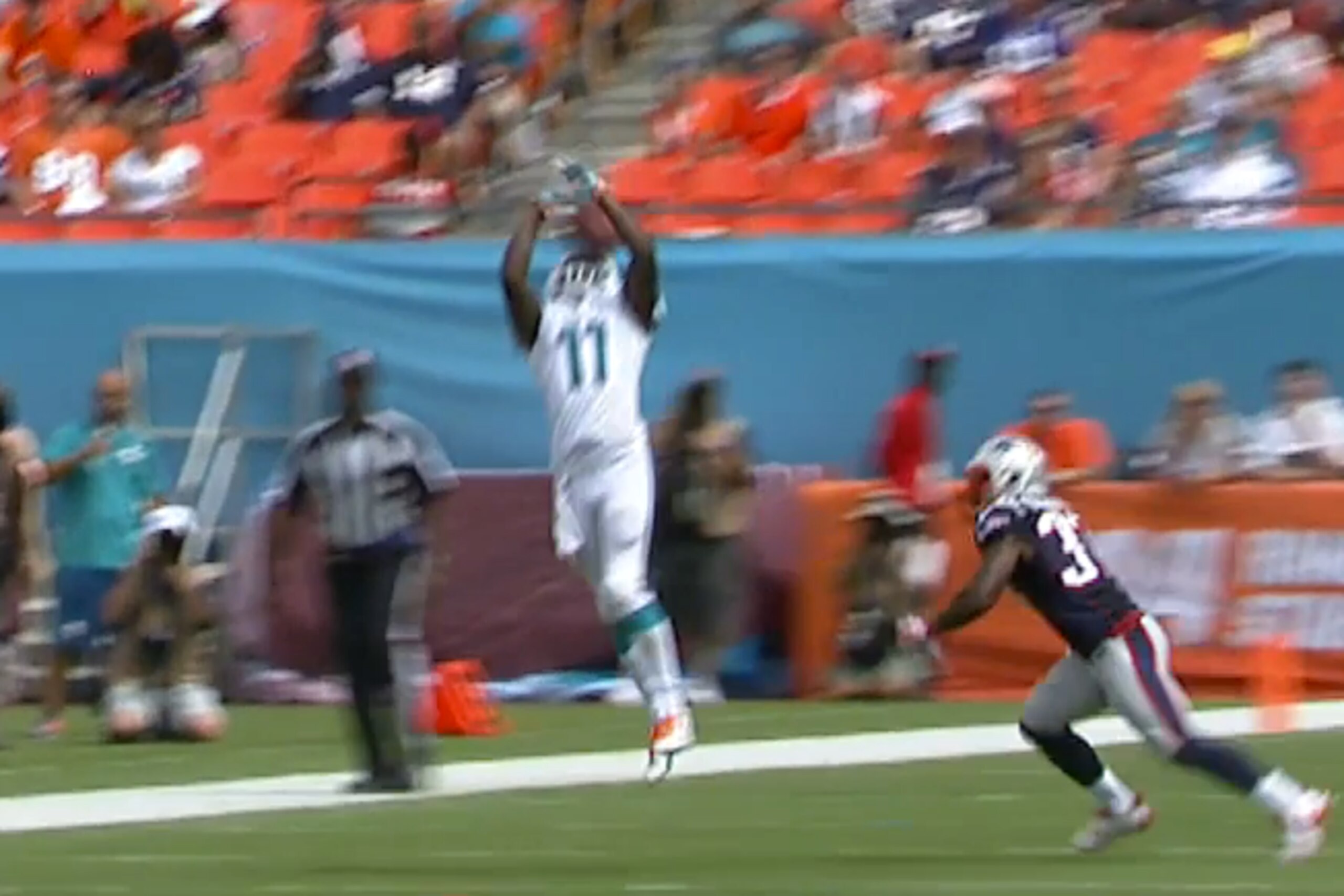 The ball goes right through Wallace's hands