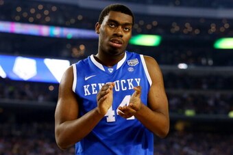 ARLINGTON, TX - APRIL 07: Dakari Johnson #44 of the Kentucky Wildcats reacts against the Connecticut Huskies during the NCAA Men's Final Four Championship at AT&T Stadium on April 7, 2014 in Arlington, Texas.  (Photo by Ronald Martinez/Getty Images)