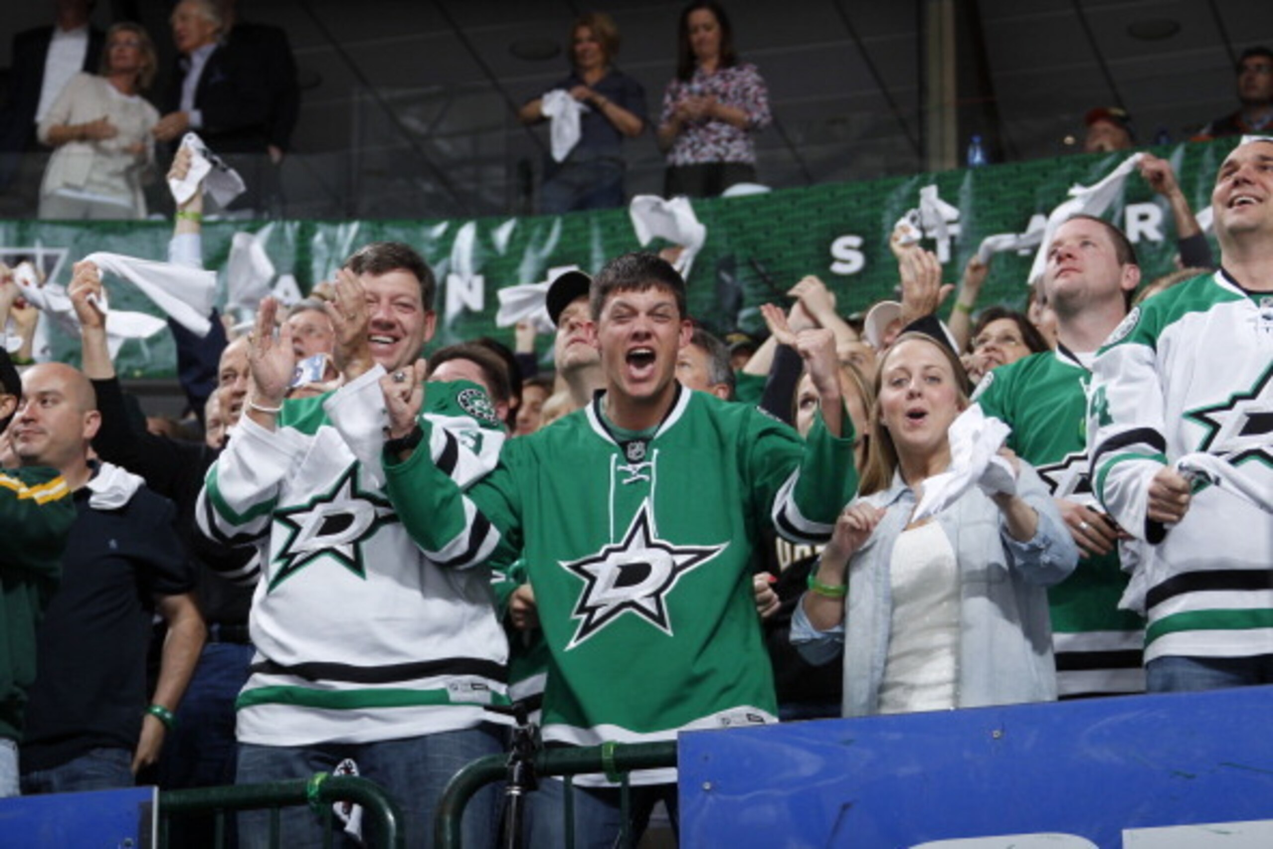 DALLAS, TX - APRIL 21: Dallas Stars fans celebrate a goal against the Anaheim Ducks in Game Three of the First Round of the 2014 Stanley Cup Playoffs at the American Airlines Center on April 21, 2014 in Dallas, Texas. (Photo by Glenn James/NHLI via Getty 