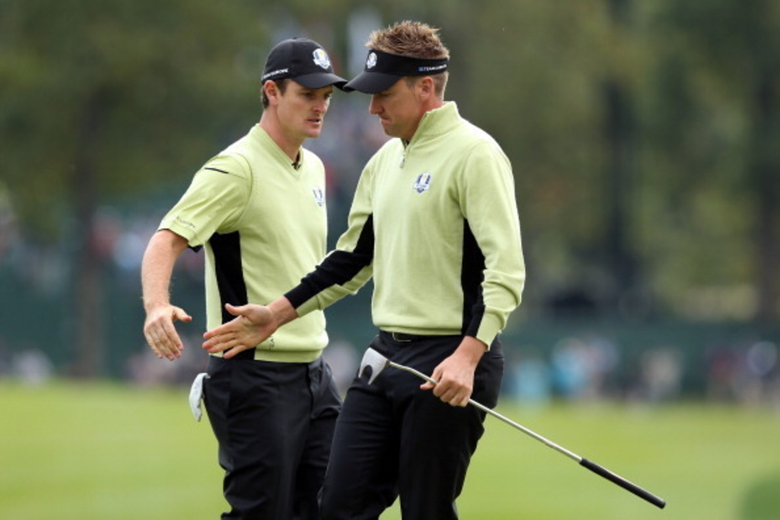 MEDINAH, IL - SEPTEMBER 28:  Justin Rose and Ian Poulter of Europe celebrate a par saving putt on the 16th green during the Morning Foursome Matches for The 39th Ryder Cup at Medinah Country Club on September 28, 2012 in Medinah, Illinois.  (Photo by Andy