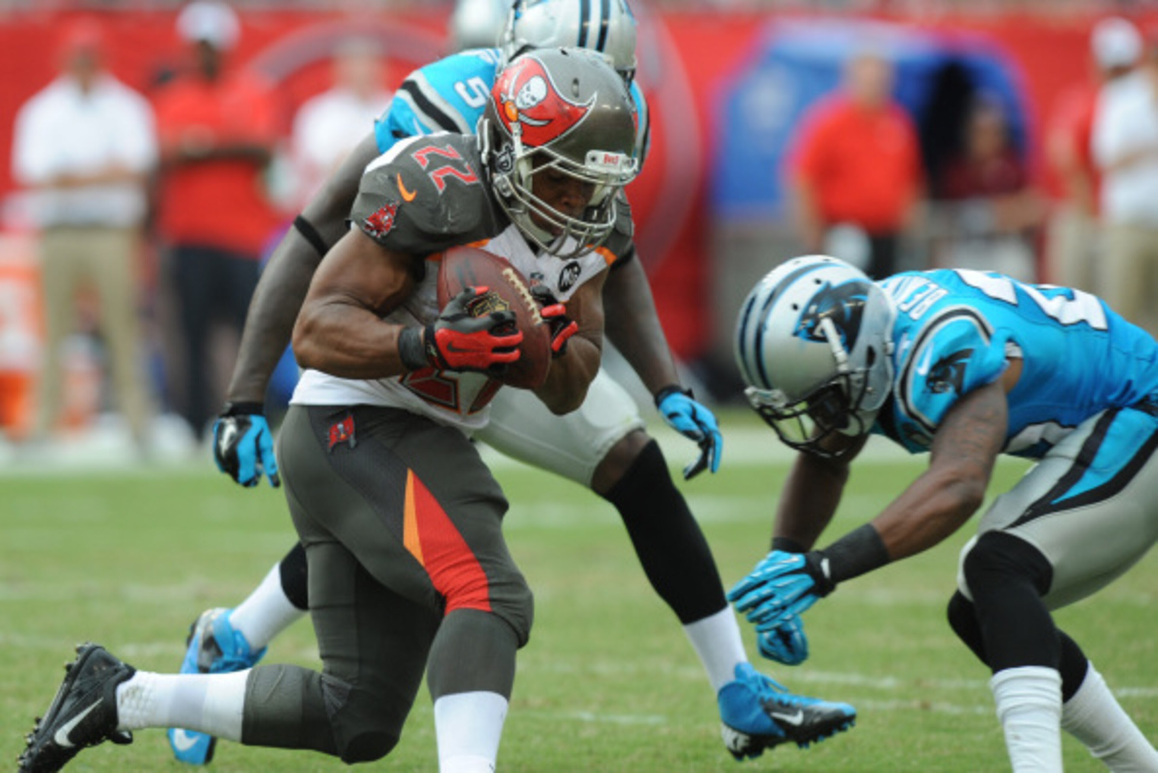 TAMPA, FL - SEPTEMBER 7: Running back Doug Martin #22 of the Tampa Bay Buccaneers runs agains Carolina Panthers at Raymond James Stadium on September 7, 2014 in Tampa, Florida. (Photo by Cliff McBride/Getty Images) )