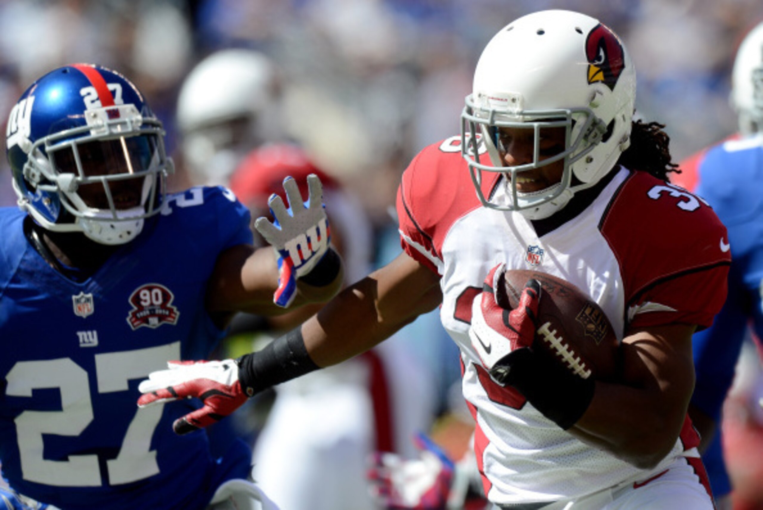 EAST RUTHERFORD, NJ - SEPTEMBER 14:  Running back Andre Ellington #38 of the Arizona Cardinals carries the ball against the New York Giants during a game at MetLife Stadium on September 14, 2014 in East Rutherford, New Jersey.  (Photo by Ron Antonelli/Get