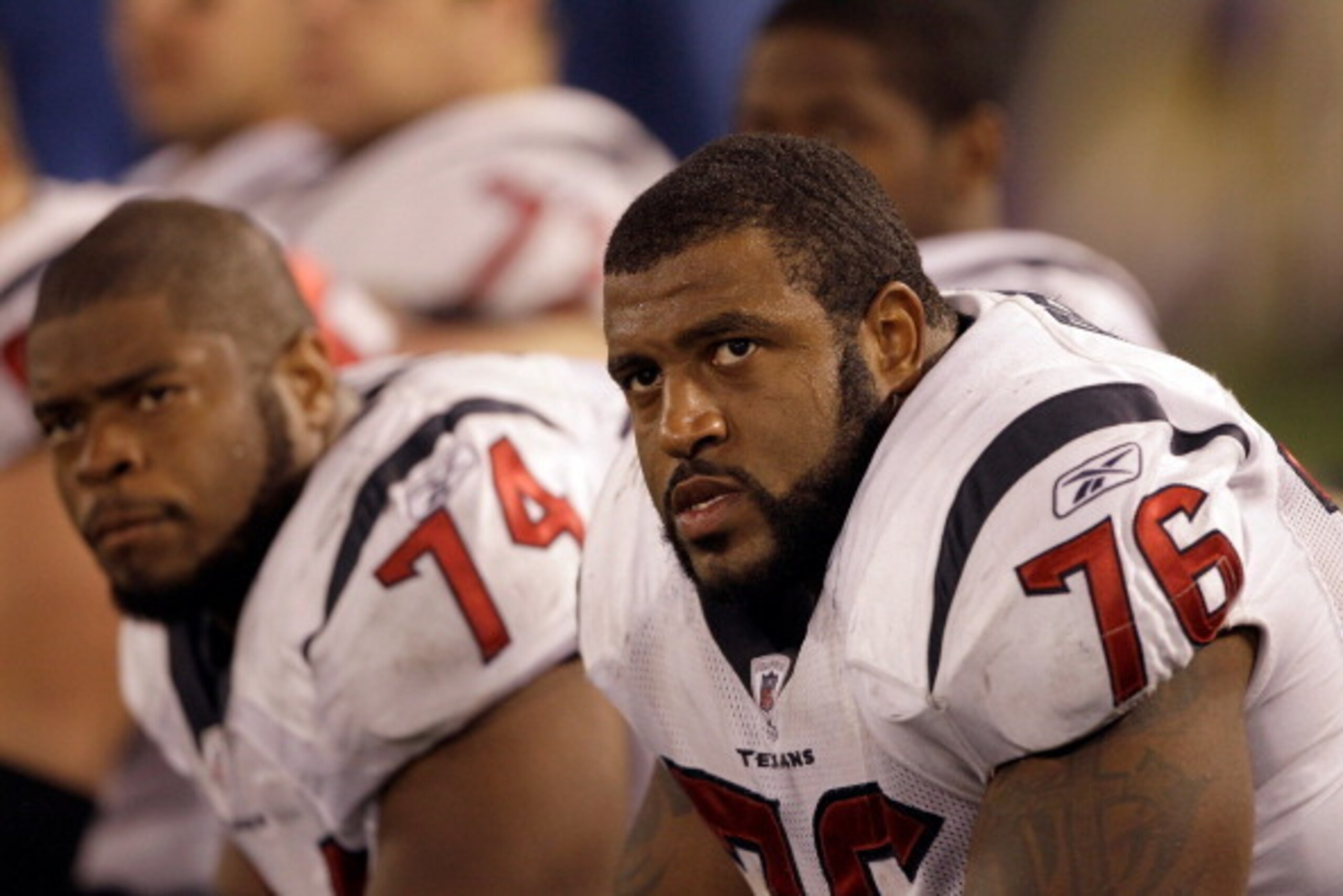 BALTIMORE, MD - OCTOBER 16: Offensive lineman  Wade Smith #74 and  Duane Brown #76 of the Houston Texans look on from the bench during the closing moments of the Texans 29-14 loss to the Baltimore Ravens at M&T Bank Stadium on October 16, 2011 in Baltimor