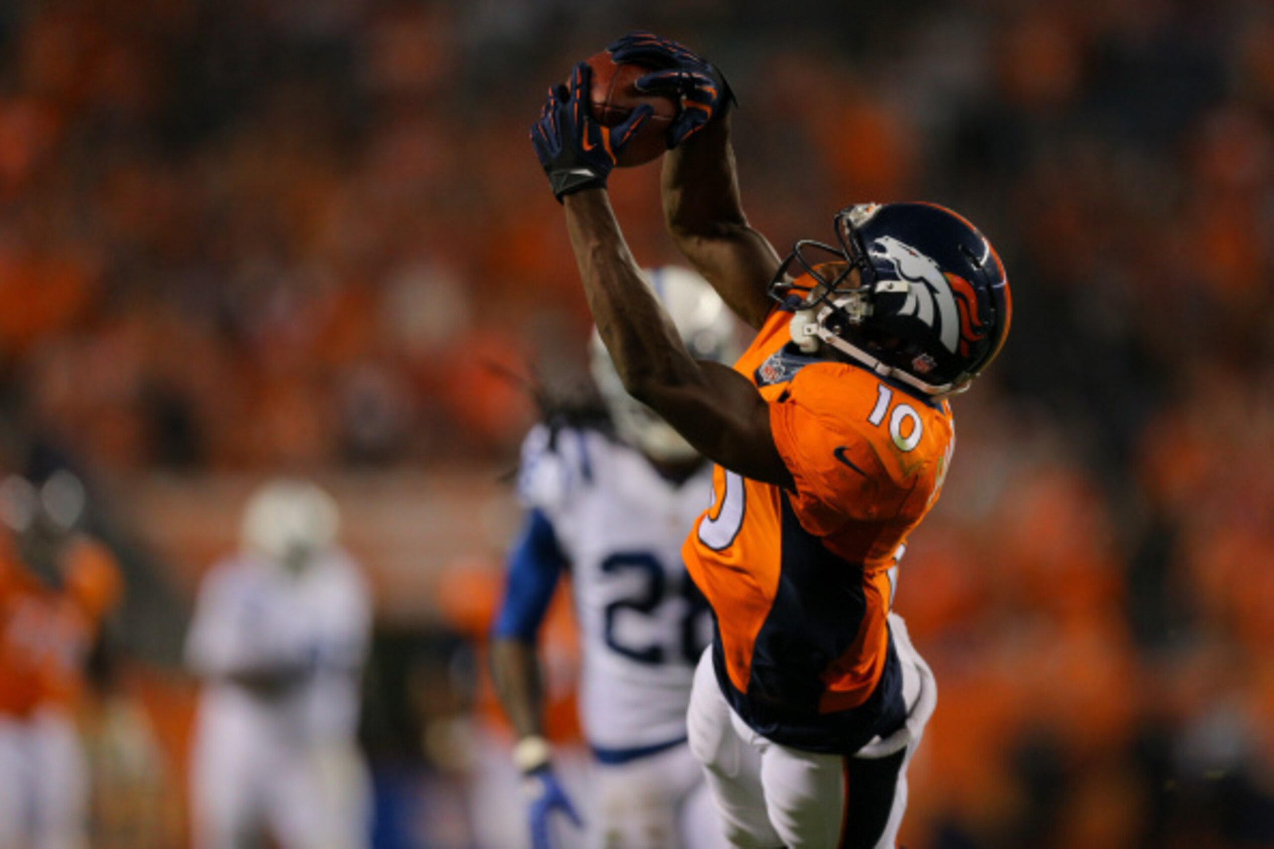 DENVER, CO - SEPTEMBER 7:  Wide receiver Emmanuel Sanders #10 of the Denver Broncos makes a reception against the Indianapolis Colts during a game at Sports Authority Field at Mile High on September 7, 2014 in Denver, Colorado.  (Photo by Justin Edmonds/G