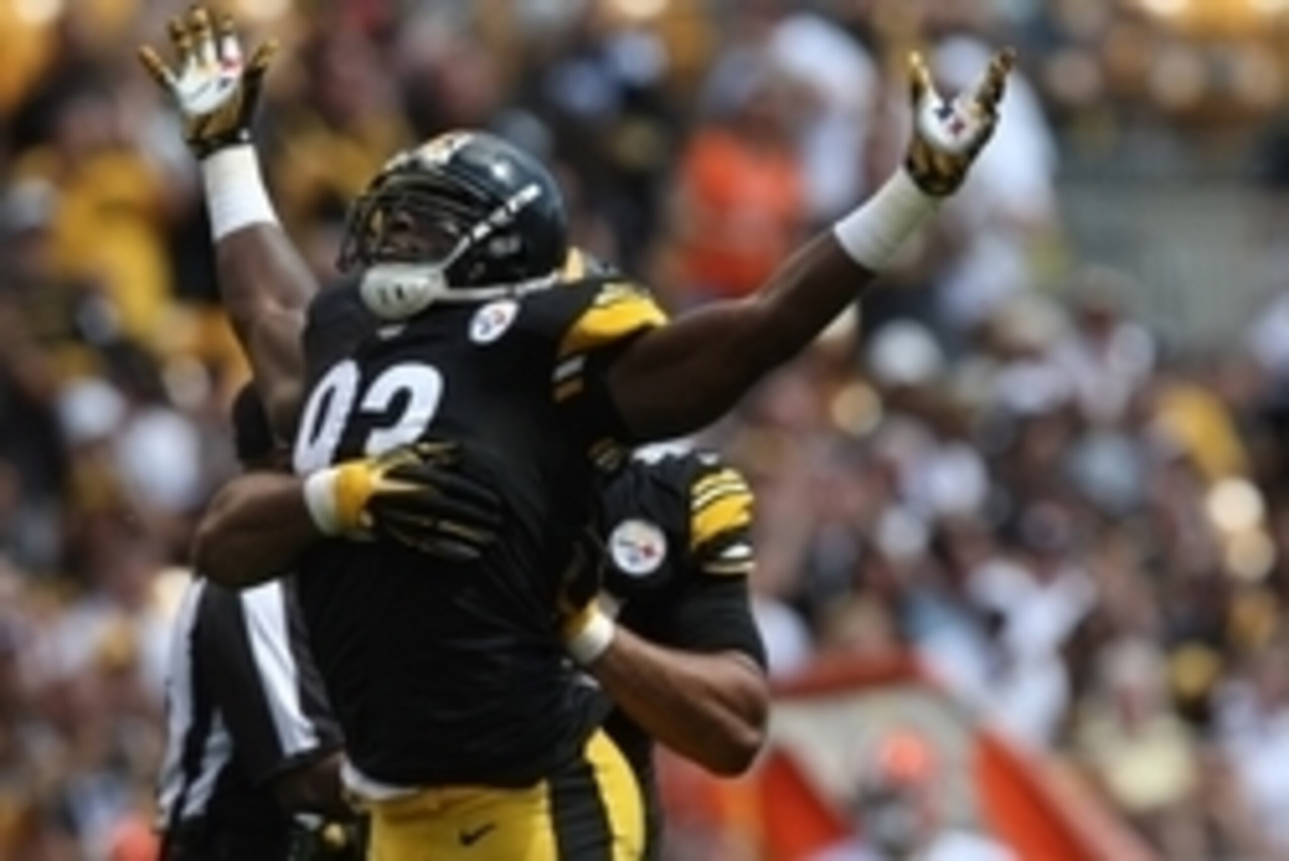 Sep 7, 2014; Pittsburgh, PA, USA; Pittsburgh Steelers linebacker Jason Worilds (93) is congratulated by defensive end Cameron Heyward (97) after sacking Cleveland Browns quarterback Brian Hoyer (not pictured) during the first half at Heinz Field. Mandator