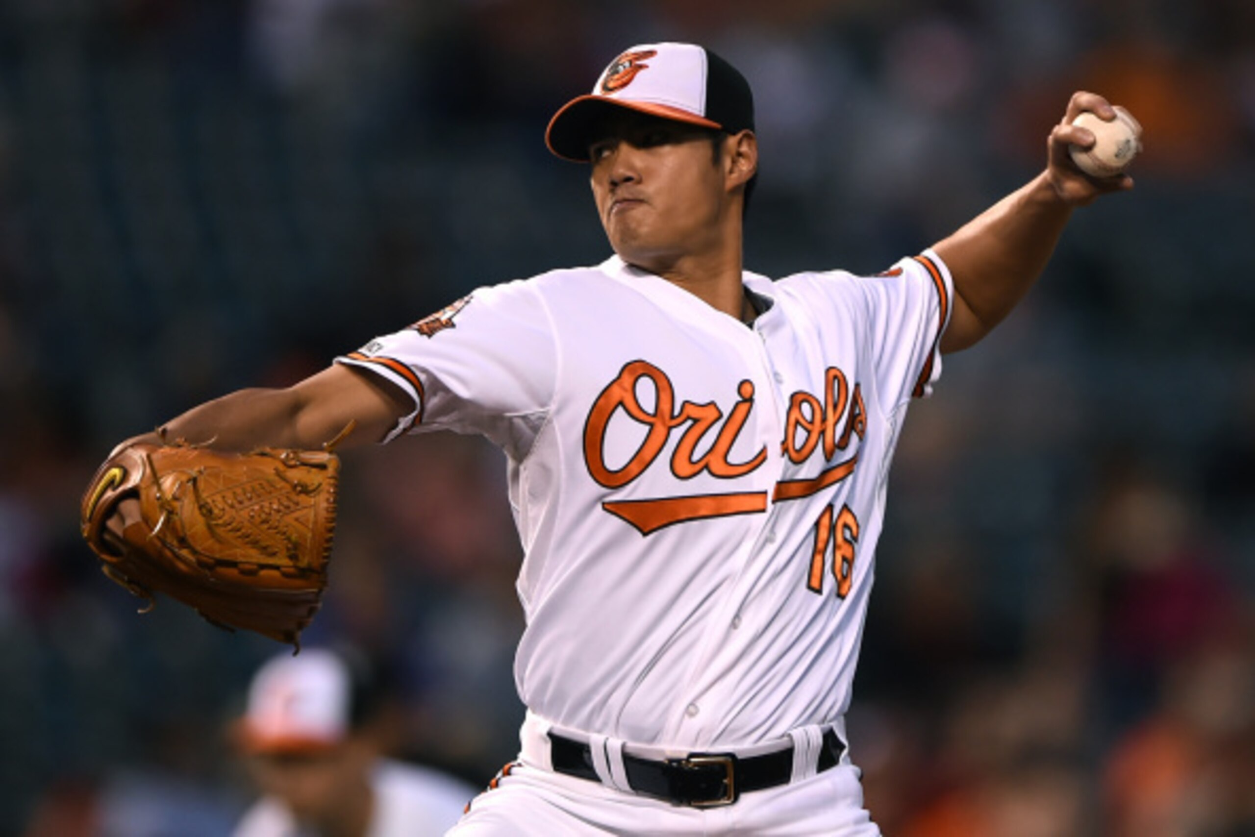 BALTIMORE, MD - SEPTEMBER 15: Starting pitcher Wei-Yin Chen #16 of the Baltimore Orioles works the first inning against the Toronto Blue Jays at Oriole Park at Camden Yards on September 15, 2014 in Baltimore, Maryland. (Photo by Patrick Smith/Getty Images