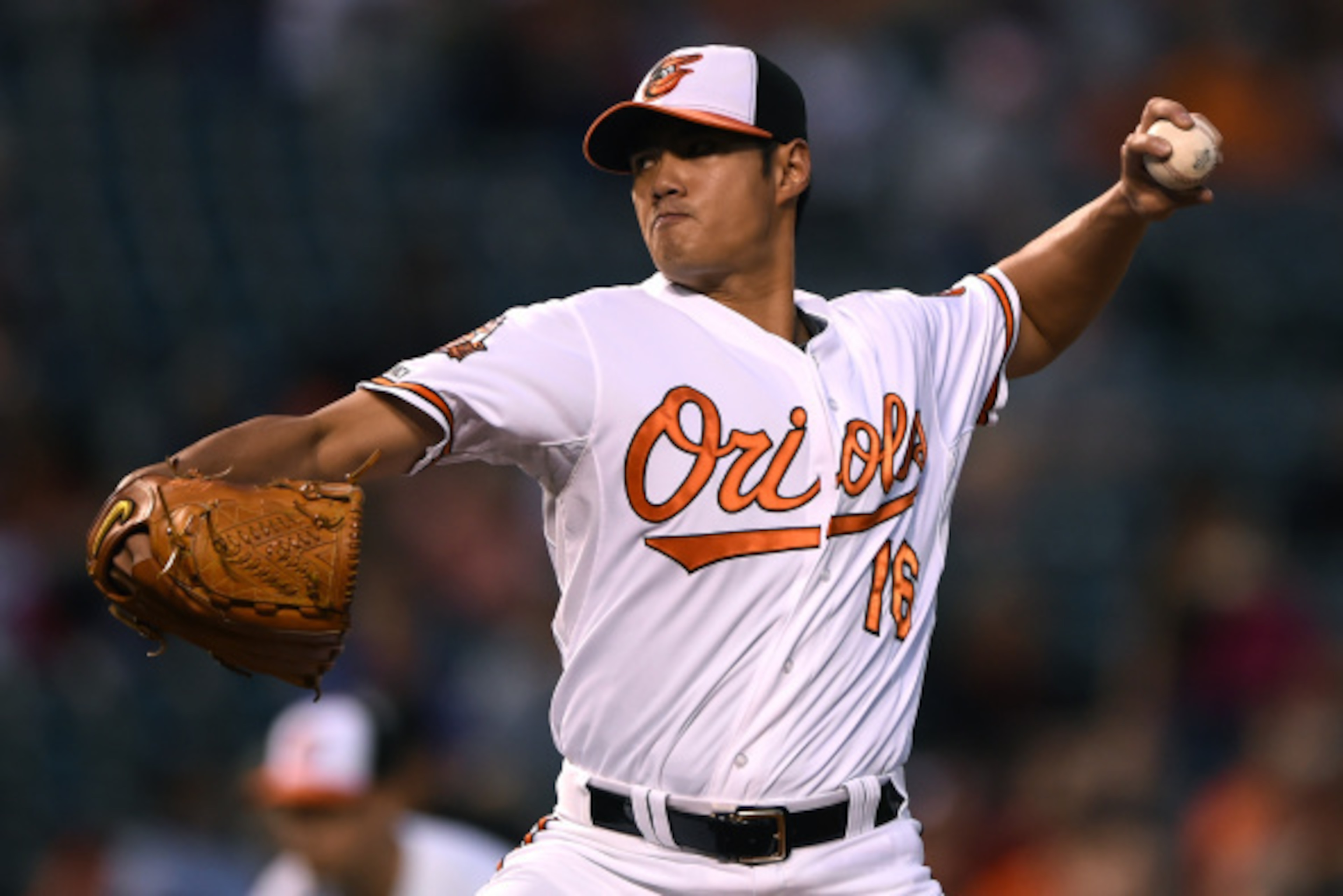 BALTIMORE, MD - SEPTEMBER 15: Starting pitcher Wei-Yin Chen #16 of the Baltimore Orioles works the first inning against the Toronto Blue Jays at Oriole Park at Camden Yards on September 15, 2014 in Baltimore, Maryland. (Photo by Patrick Smith/Getty Images