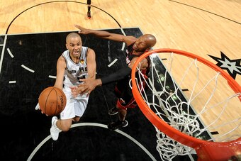 SAN ANTONIO, TX - JUNE 15: Tony Parker #9 of the San Antonio Spurs shoots against Ray Allen #34 of the Miami Heat during Game Five of the 2014 NBA Finals between the Miami Heat and San Antonio Spurs at AT&T Center on June 15, 2014 in San Antonio, Texas. N
