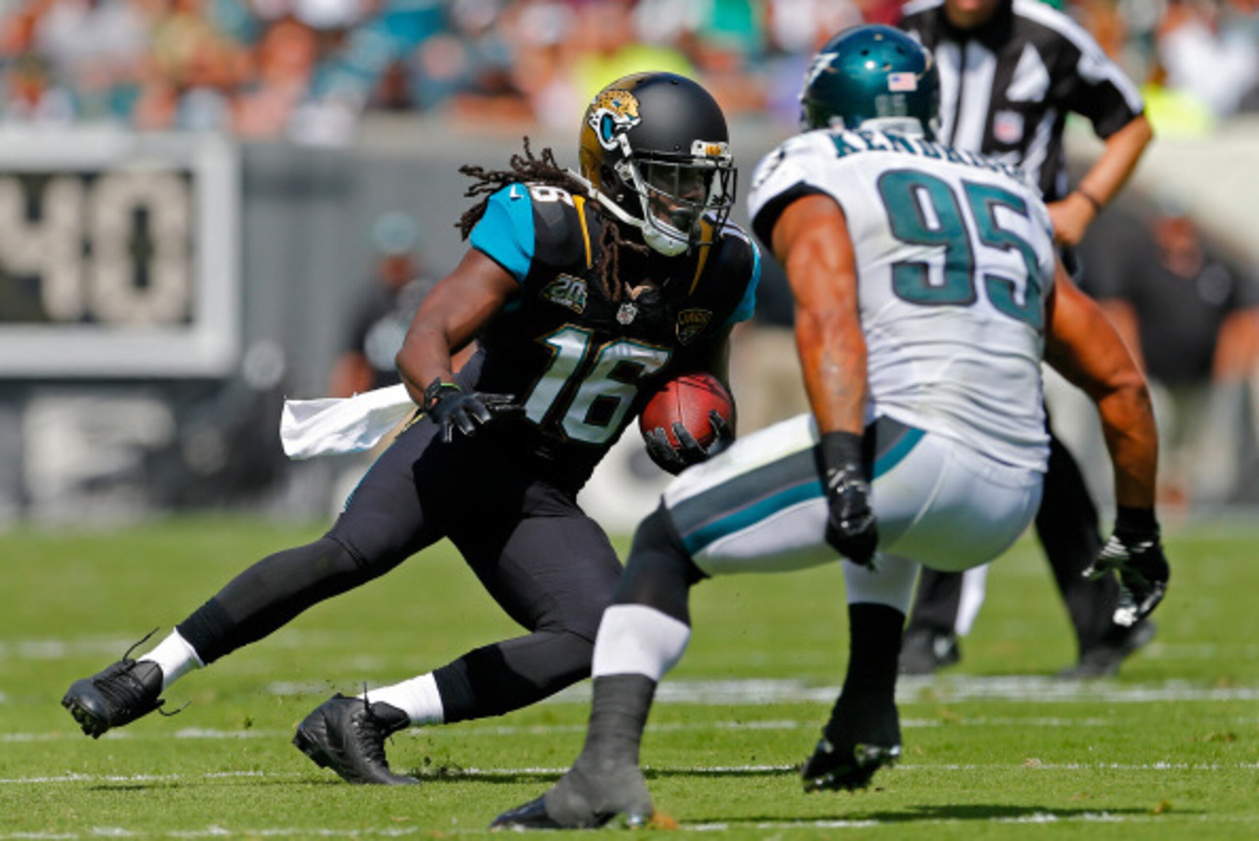PHILADELPHIA, PA - SEPTEMBER 07: Denard Robinson #16 of the Jacksonville Jaguars looks to get past Mychal Kendricks #95 of the Philadelphia Eagles after making a catch during the first quarter of a NFL game at Lincoln Financial Field on September 7, 2014 