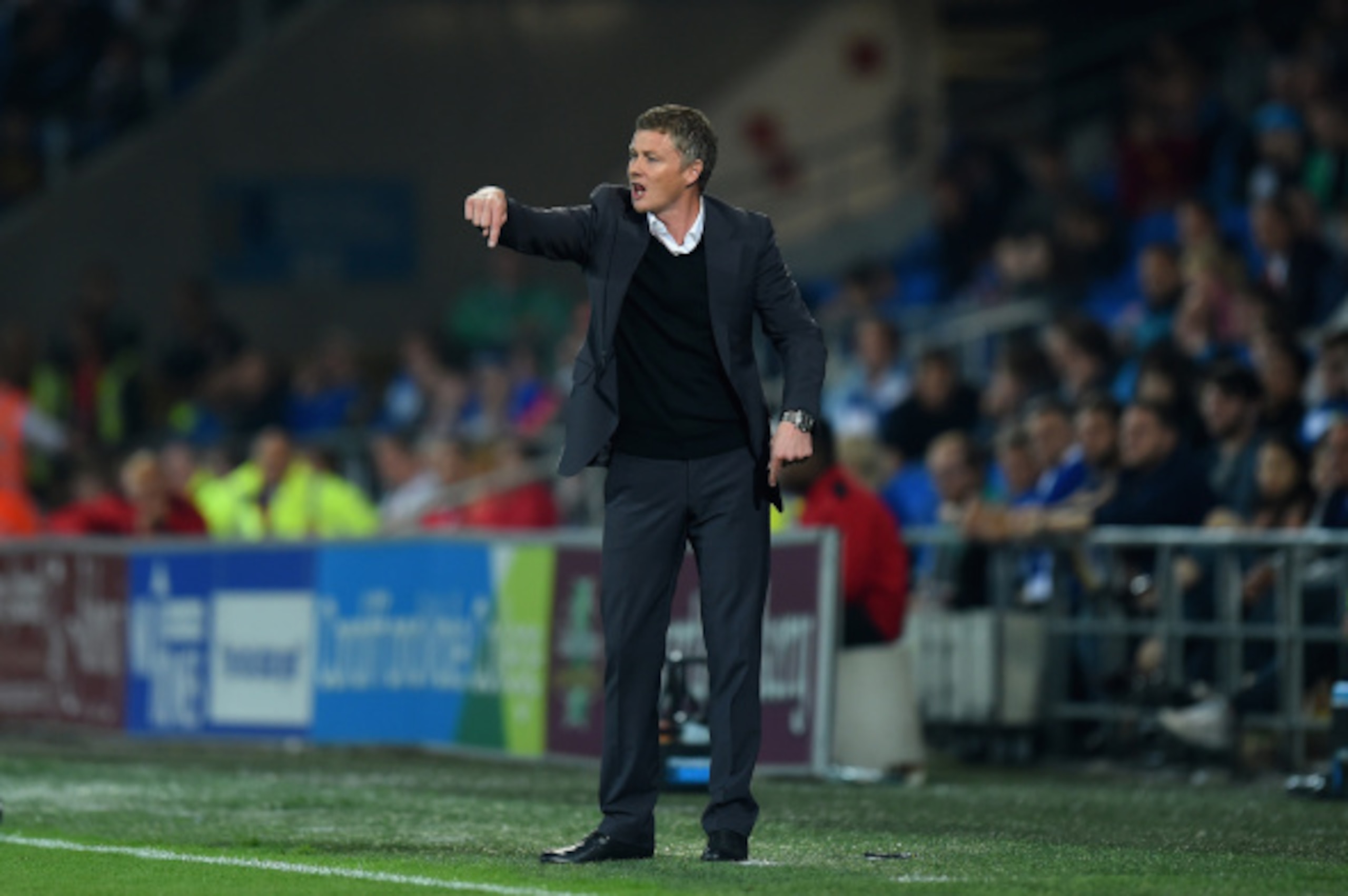 CARDIFF, WALES - SEPTEMBER 16:  Cardiff manager Ole Gunnar Solskjaer reacts during the Sky Bet Championship match between Cardiff City and Middlesbrough at Cardiff City Stadium on September 16, 2014 in Cardiff, Wales.  (Photo by Stu Forster/Getty Images)