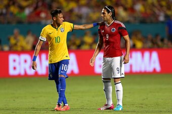 MIAMI GARDENS, FL - SEPTEMBER 05:  Falcao #9 of Colombia greets Neymar #10 of Brazil during an International Soccer friendly against Brazil at Sun Life Stadium on September 5, 2014 in Miami Gardens, Florida.  (Photo by Mike Ehrmann/Getty Images)