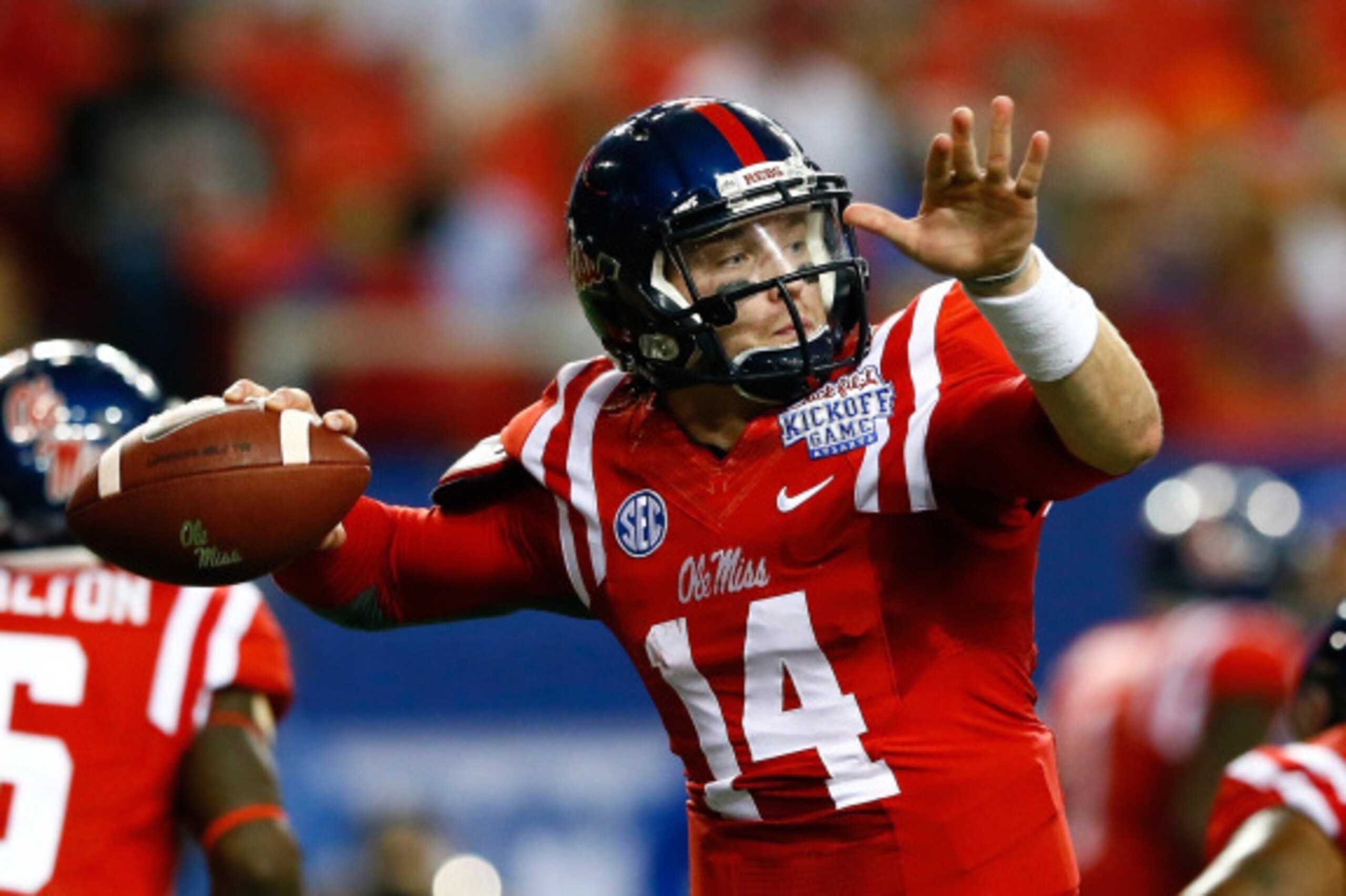 ATLANTA, GA - AUGUST 28:  Bo Wallace #14 of the Mississippi Rebels looks to pass against the Boise State Broncos at Georgia Dome on August 28, 2014 in Atlanta, Georgia.  (Photo by Kevin C. Cox/Getty Images)