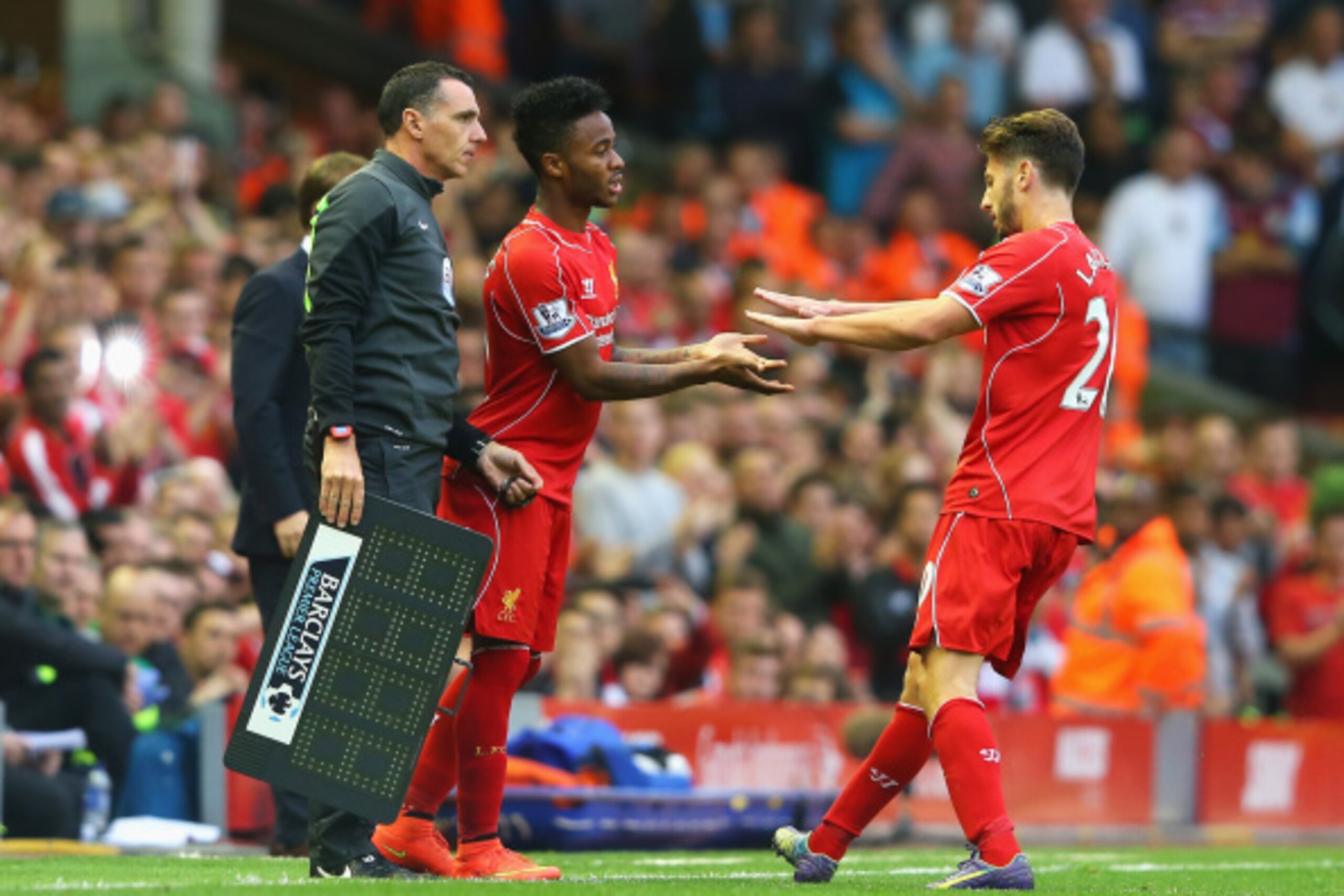 LIVERPOOL, ENGLAND - SEPTEMBER 13: Raheem Sterling of Liverpool comes on for Adam Lallana of Liverpool during the Barclays Premier League match between Liverpool and Aston Villa at Anfield on September 13, 2014 in Liverpool, England.  (Photo by Alex Lives