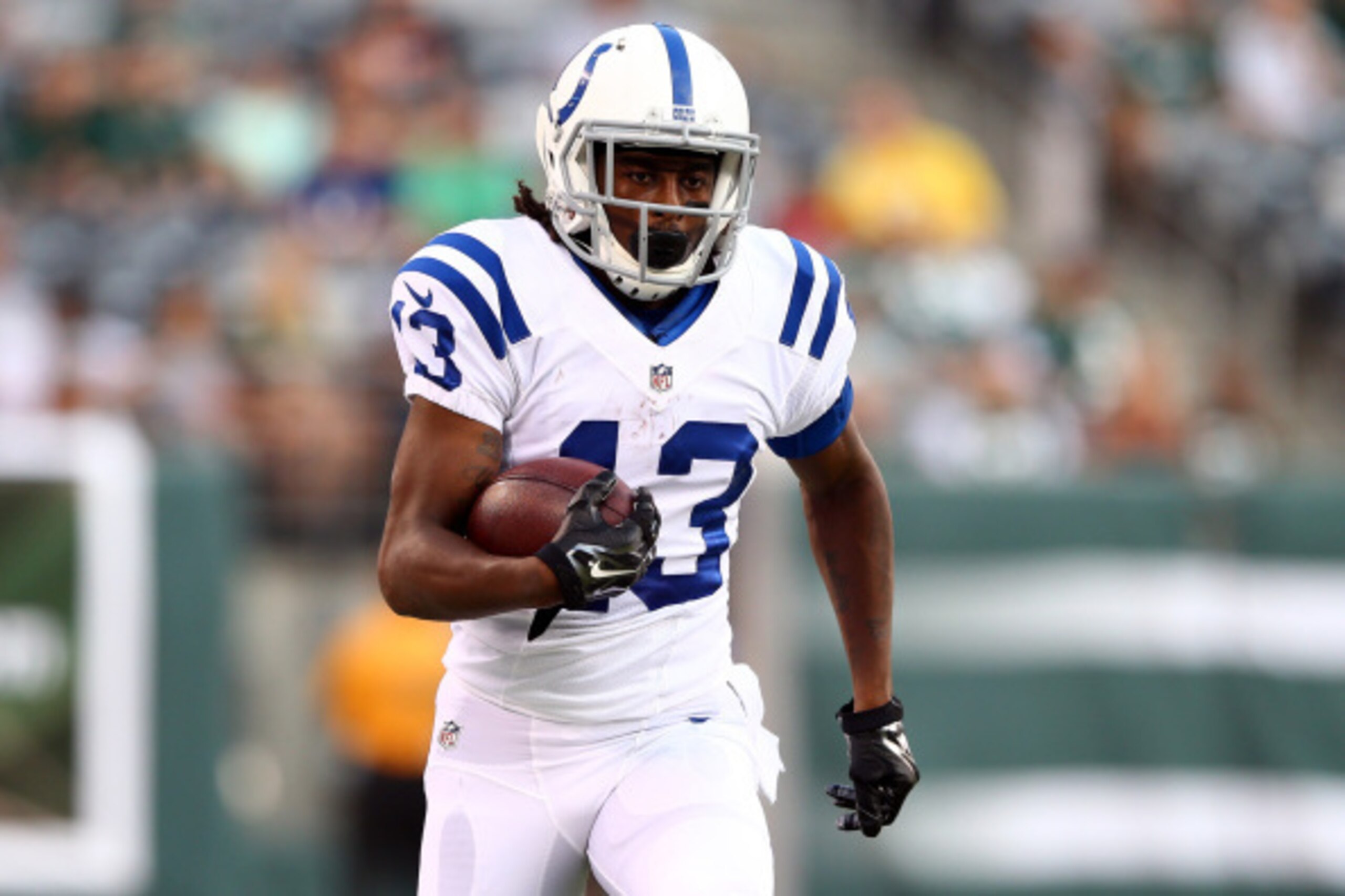 EAST RUTHERFORD, NJ - AUGUST 07: Wide receiver T.Y. Hilton #13 of the Indianapolis Colts carries the ball against the New York Jets during a preseason game at MetLife Stadium on August 7, 2014 in East Rutherford, New Jersey. (Photo by Elsa/Getty Images) EAST RUTHERFORD, NJ - AUGUST 07: Wide receiver T.Y. Hilton #13 of the Indianapolis Colts carries the ball against the New York Jets during a preseason game at MetLife Stadium on August 7, 2014 in East Rutherford, New Jersey. (Photo by Elsa/Getty Images)