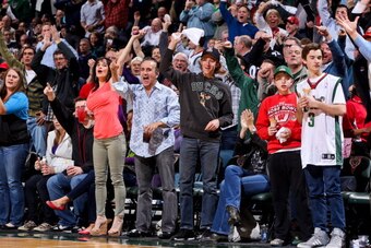 MILWAUKEE, WI - APRIL 25: Milwaukee Bucks fans cheer their team on against the Miami Heat in Game Three of the Eastern Conference Quarterfinals during the 2013 NBA Playoffs on April 25, 2013 at the BMO Harris Bradley Center in Milwaukee, Wisconsin. NOTE T