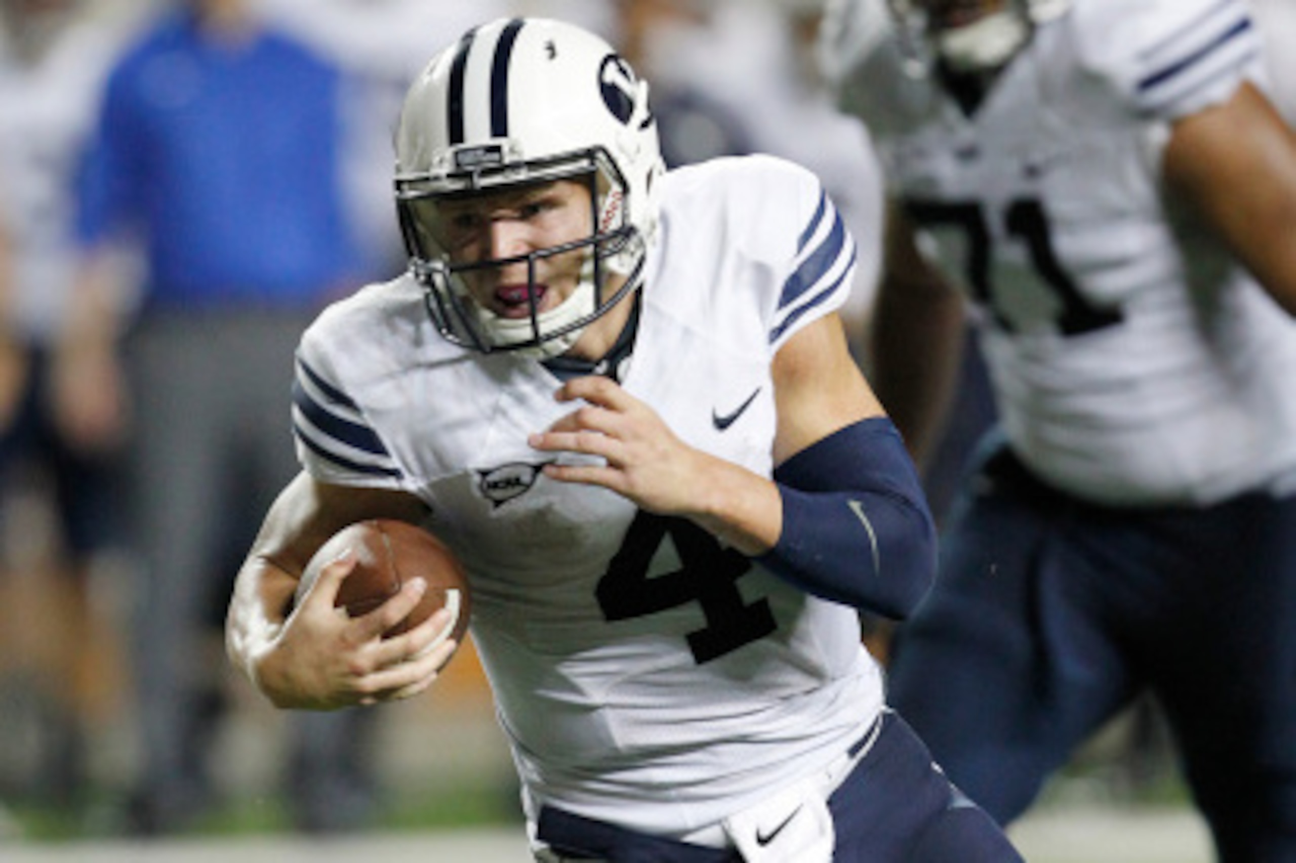 AUSTIN, TX - SEPTEMBER 6: Taysom Hill #4 of the BYU Cougars runs with the ball against the Texas Longhorns on September 6, 2014 at Darrell K Royal-Texas Memorial Stadium in Austin, Texas. (Photo by Chris Covatta/Getty Images) AUSTIN, TX - SEPTEMBER 6: Taysom Hill #4 of the BYU Cougars runs with the ball against the Texas Longhorns on September 6, 2014 at Darrell K Royal-Texas Memorial Stadium in Austin, Texas. (Photo by Chris Covatta/Getty Images)