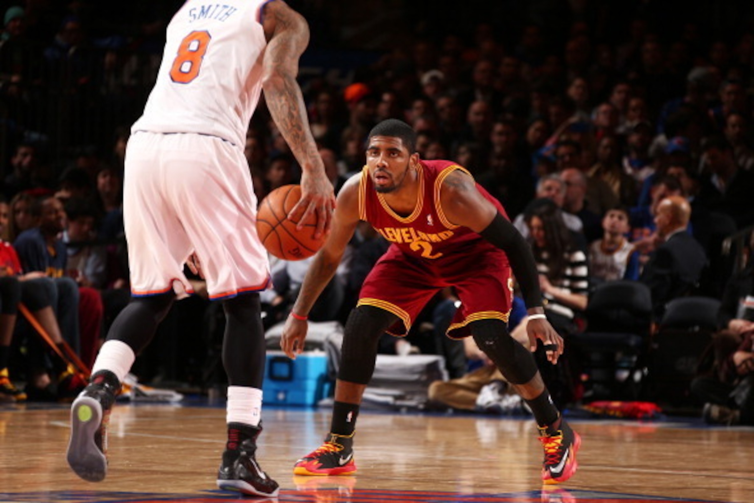NEW YORK, NY - JANUARY 30: Kyrie Irving #2 of the Cleveland Cavaliers plays defense against J.R. Smith #8 of the New York Knicks during a game at Madison Square Garden in New York City on January 30, 2014.  NOTE TO USER: User expressly acknowledges and ag