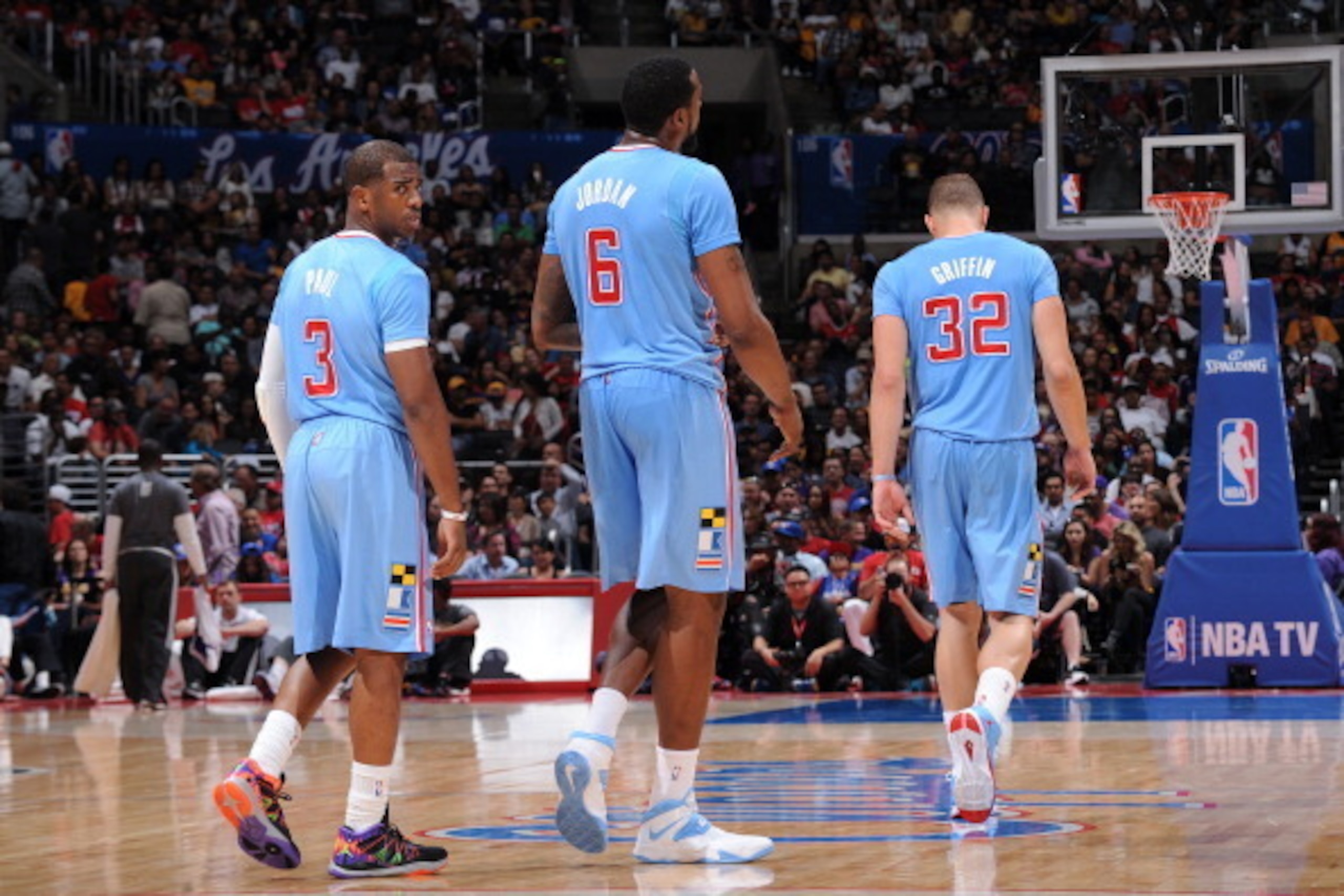 LOS ANGELES, CA - APRIL 6:  Chris Paul #3 of the Los Angeles Clippers walk up court with Blake Griffin #32 and DeAndre Jordan #6 at Staples Center on April 6, 2014 in Los Angeles, California. NOTE TO USER: User expressly acknowledges and agrees that, by d