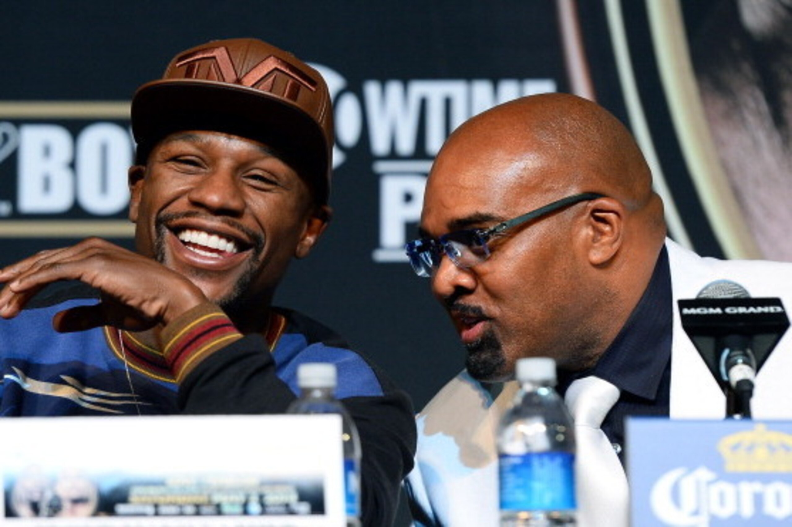 LAS VEGAS, NV - APRIL 30:  WBC welterweight champion Floyd Mayweather Jr. (L) and CEO of Mayweather Promotions Leonard Ellerbe attend a news conference at the MGM Grand Hotel/Casino on April 30, 2014 in Las Vegas, Nevada. Mayweather will fight WBA champio