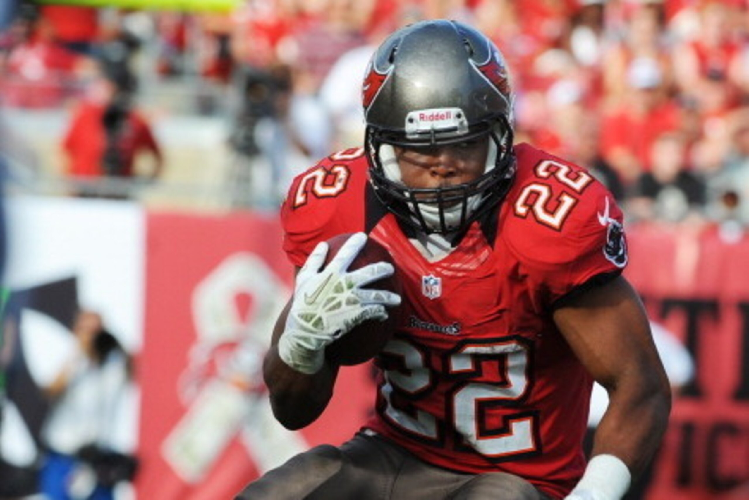 TAMPA, FL - NOVEMBER 11: Running back Doug Martin #22 of the Tampa Bay Buccaneers rushes upfield in the fourth quarter against the San Diego Chargers November 11, 2012 at Raymond James Stadium in Tampa, Florida. Tampa won 34 - 24. (Photo by Al Messerschmi