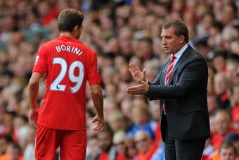 LIVERPOOL, ENGLAND - AUGUST 26:  Liverpool Manager Brendan Rogers encourages Fabio Borini of Liverpool during the Barclays Premier League match between Liverpool and Manchester City at Anfield on August 26, 2012 in Liverpool, England.  (Photo by Michael R