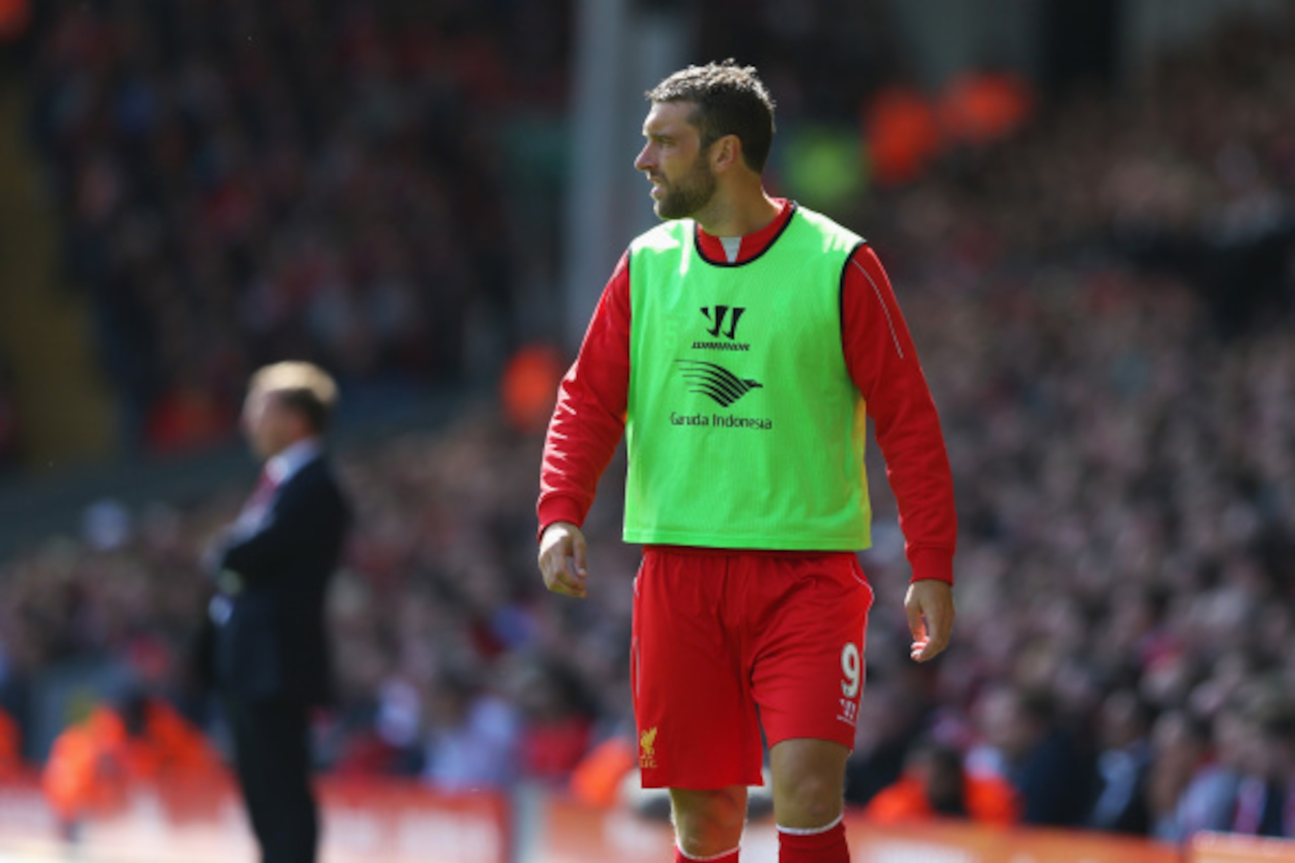 LIVERPOOL, ENGLAND - AUGUST 17: Rickie Lambert of Liverpool looks on from the sidelines during the Barclays Premier League match between Liverpool and Southampton at Anfield on August 17, 2014 in Liverpool, England.  (Photo by Alex Livesey/Getty Images)