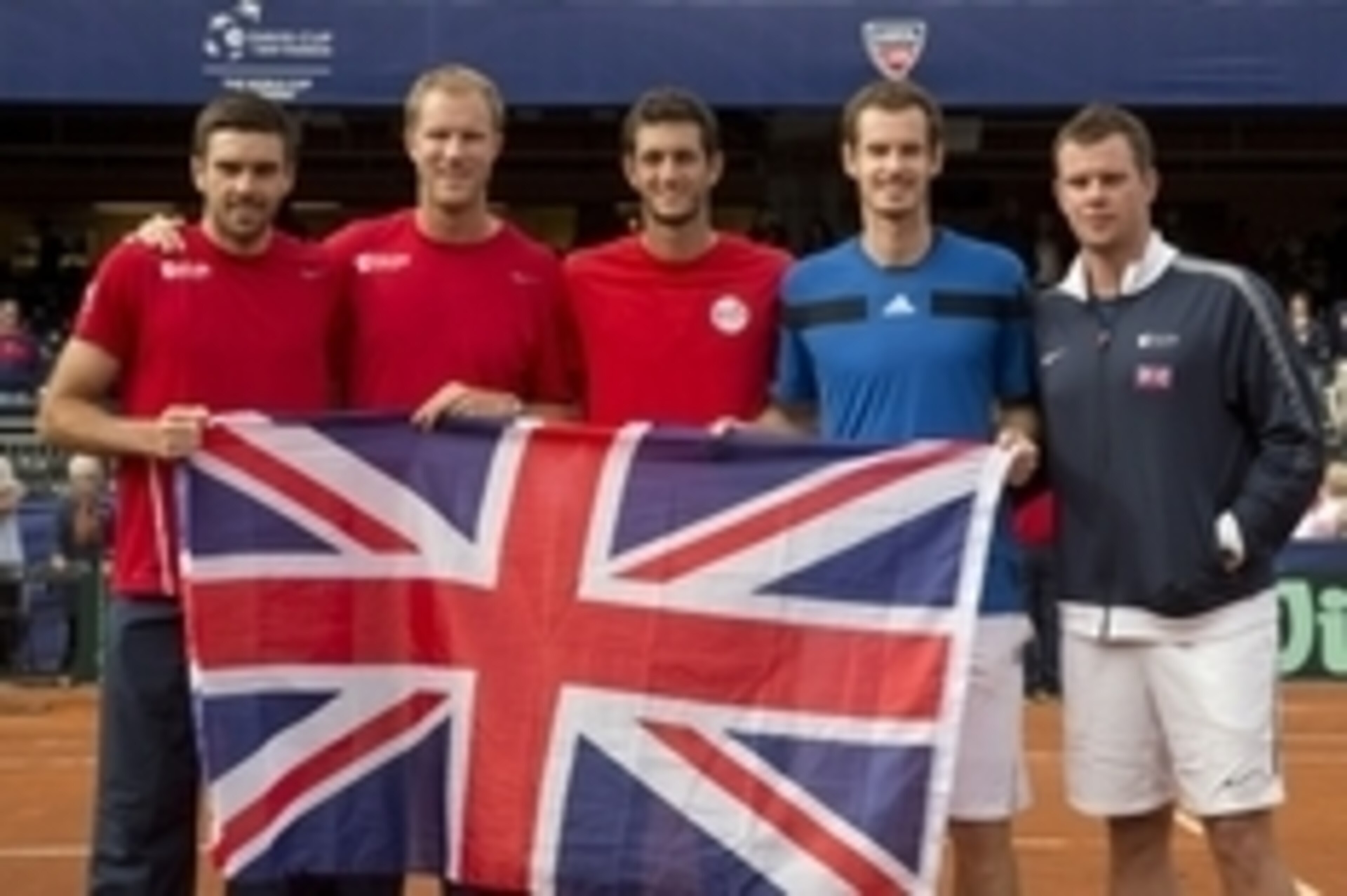 Feb 2, 2014; San Diego, CA, USA; Colin Fleming, Dominic Inglot, James Ward, Andy Murray and Captain Leon Smith (GBR) pose with the British flag after defeating the USA in their Davis Cup tie at Petco Park. Mandatory Credit: Susan Mullane-USA TODAY Sports