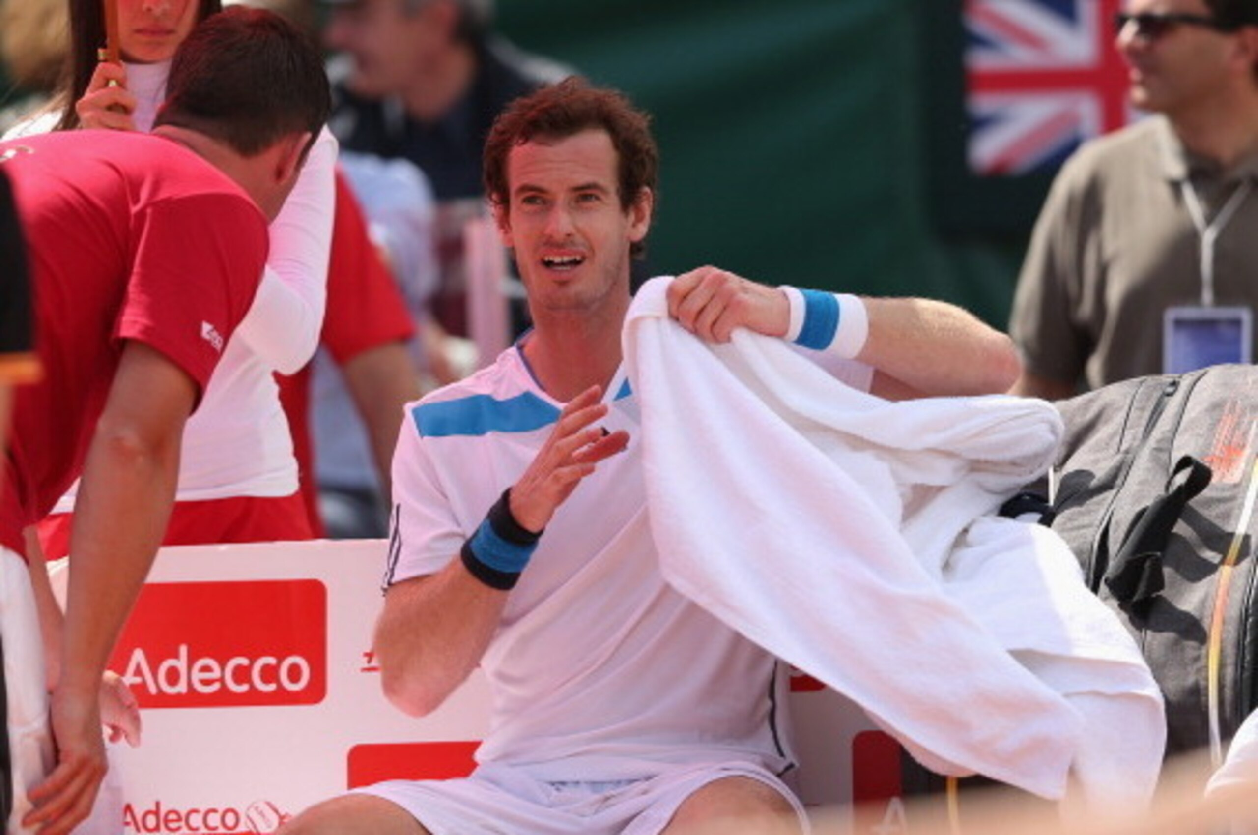 NAPLES, ITALY - APRIL 06:  Andy Murray of Great Britain shows his dejection in the changeover during his straight sets defeat in the fourth rubber by Fabio Fognini of Italy  during day three of the Davis Cup World Group Quarter Final match between Italy a