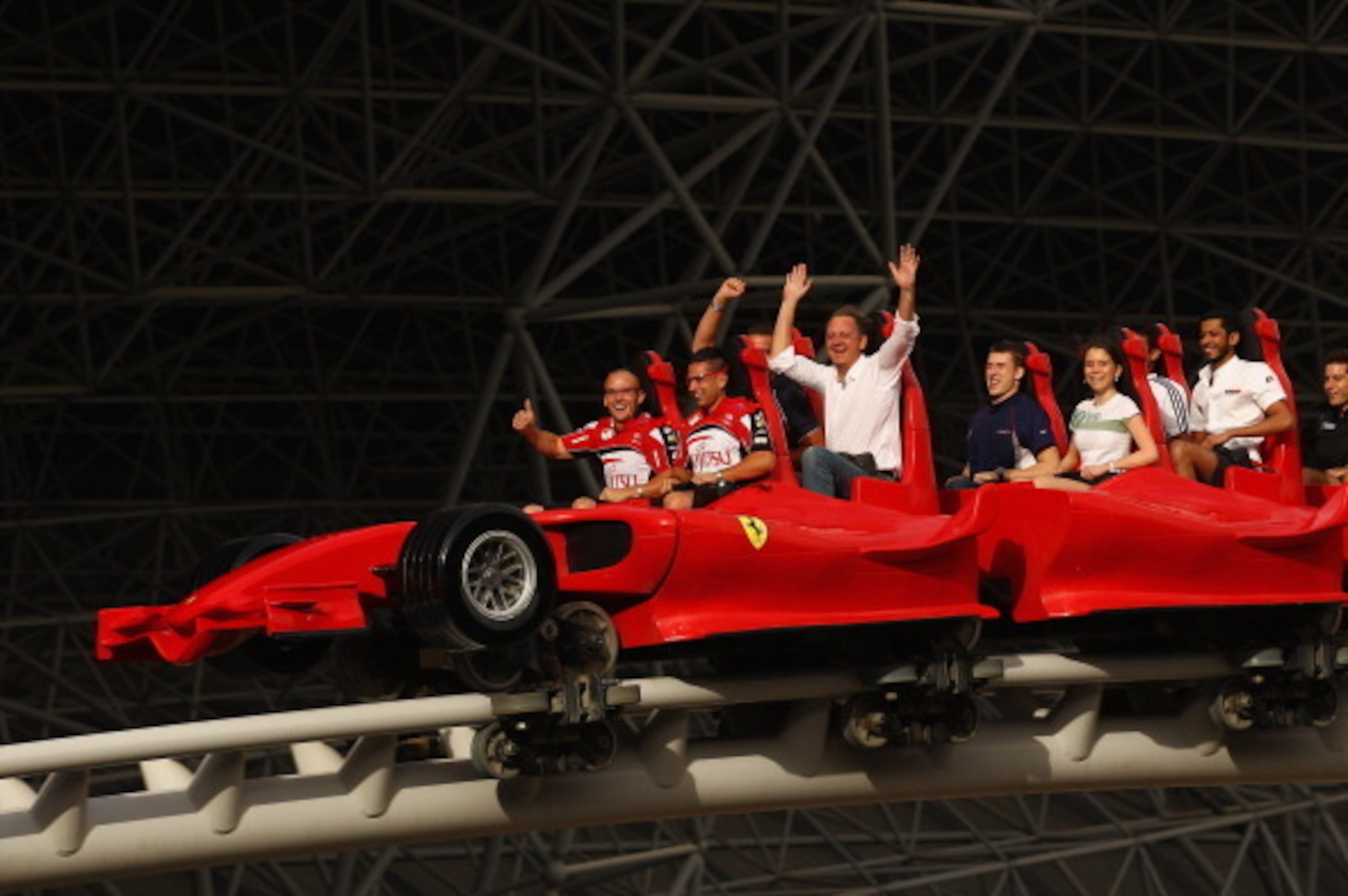 ABU DHABI, UNITED ARAB EMIRATES - FEBRUARY 09:  Lee Holdsworth and Michael Caruso of the Fujitsu GRM Racing Team take a ride on a rollercoaster at Ferrari World on February 9, 2011 in Abu Dhabi, United Arab Emirates.  (Photo by Robert Cianflone/Getty Imag