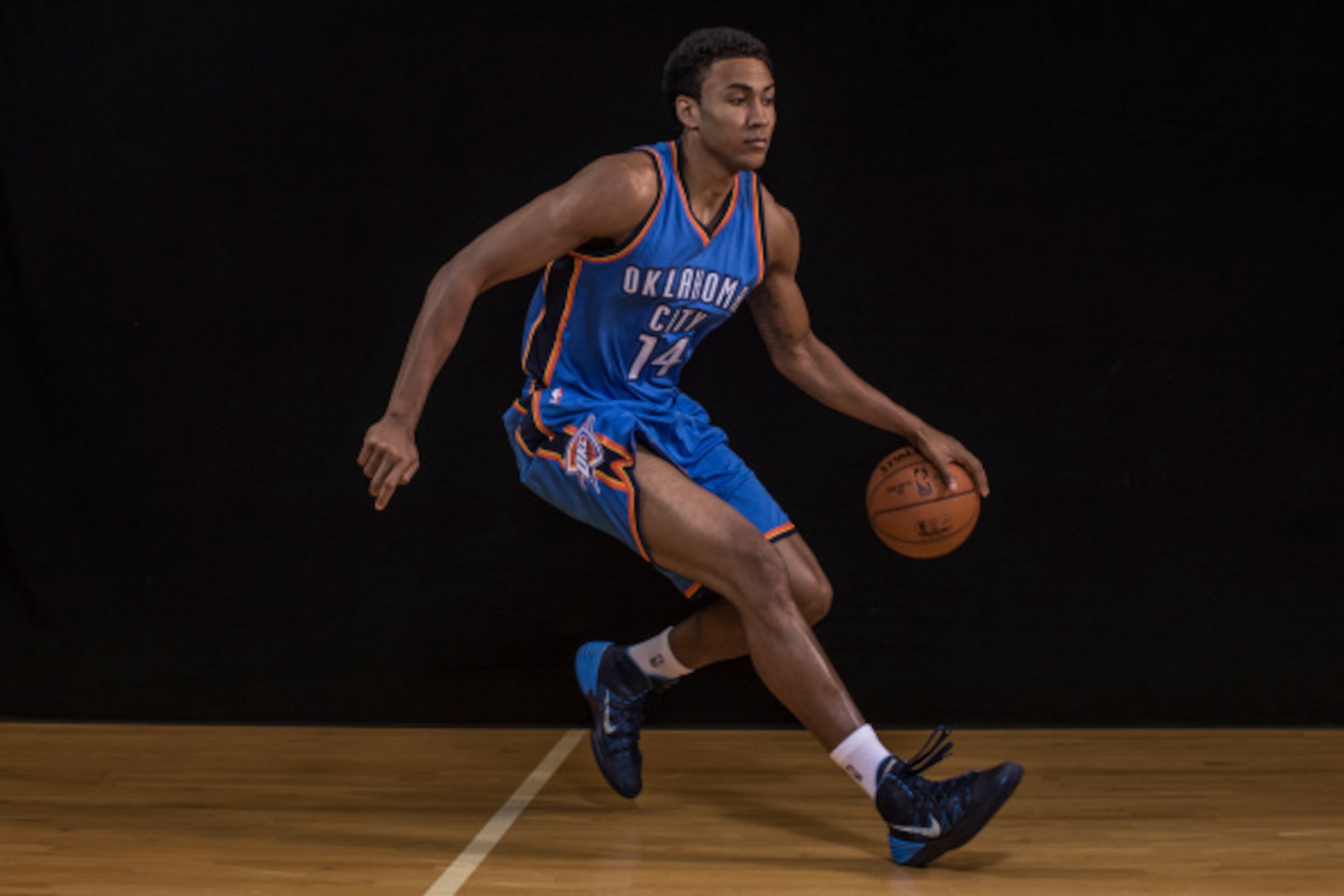 TARRYTOWN, NY - AUGUST 03: Josh Huestis #14 of the Oklahoma City Thunder poses for a portrait during the 2014 NBA rookie photo shoot at MSG Training Center on August 3, 2014 in Tarrytown, New York. NOTE TO USER: User expressly acknowledges and agrees that