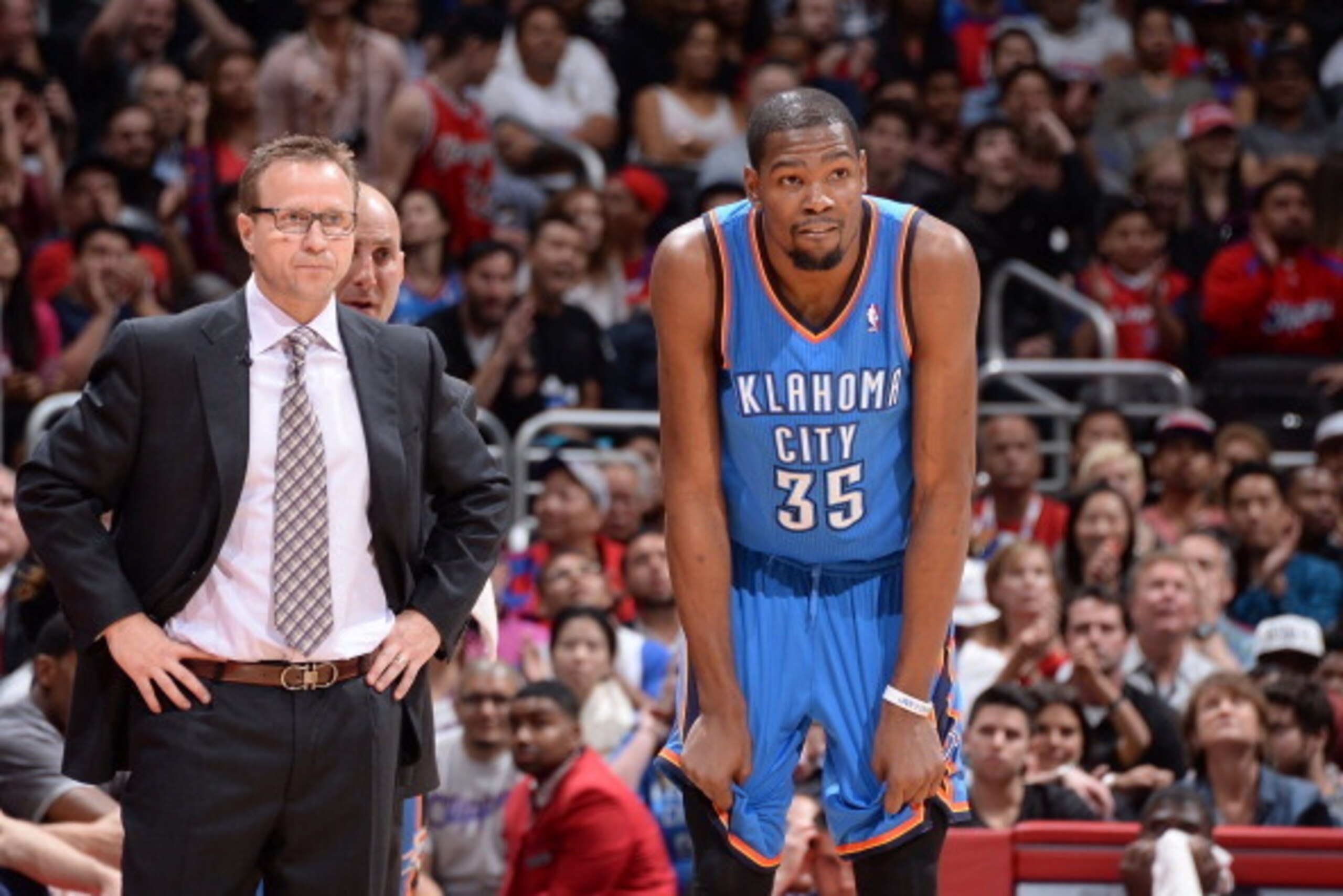 LOS ANGELES, CA - APRIL 9: Head coach Scott Brooks of the Oklahoma City Thunder and Kevin Durant #35 look on against the Los Angeles Clippers at Staples Center on April 9, 2014 in Los Angeles, California. NOTE TO USER: User expressly acknowledges and agre