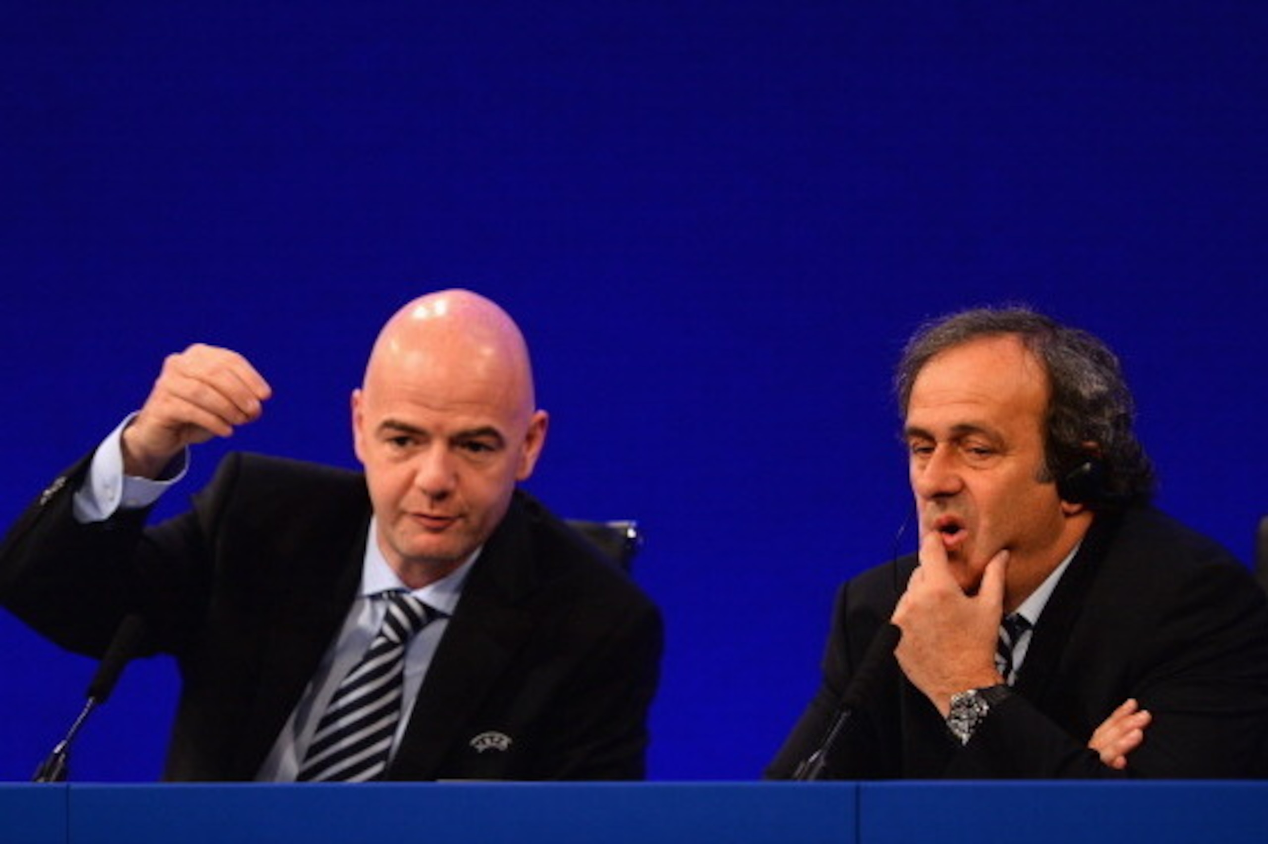 LONDON, ENGLAND - MAY 24:  UEFA General Secretary, Gianni Infantino and UEFA President Michel Platini speak to the media during a Press Conference at the XXXVII Ordinary UEFA Congress at the Grovesnor House Hotel on May 24, 2013 in London, United Kingdom.