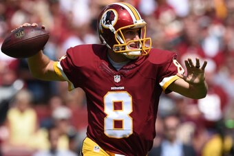 LANDOVER, MD - SEPTEMBER 14: Quarterback Kirk Cousins #8 of the Washington Redskins in action against the Jacksonville Jaguars at FedExField on September 14, 2014 in Landover, Maryland. The Washington Redskins won, 41-10. (Photo by Patrick Smith/Getty Ima